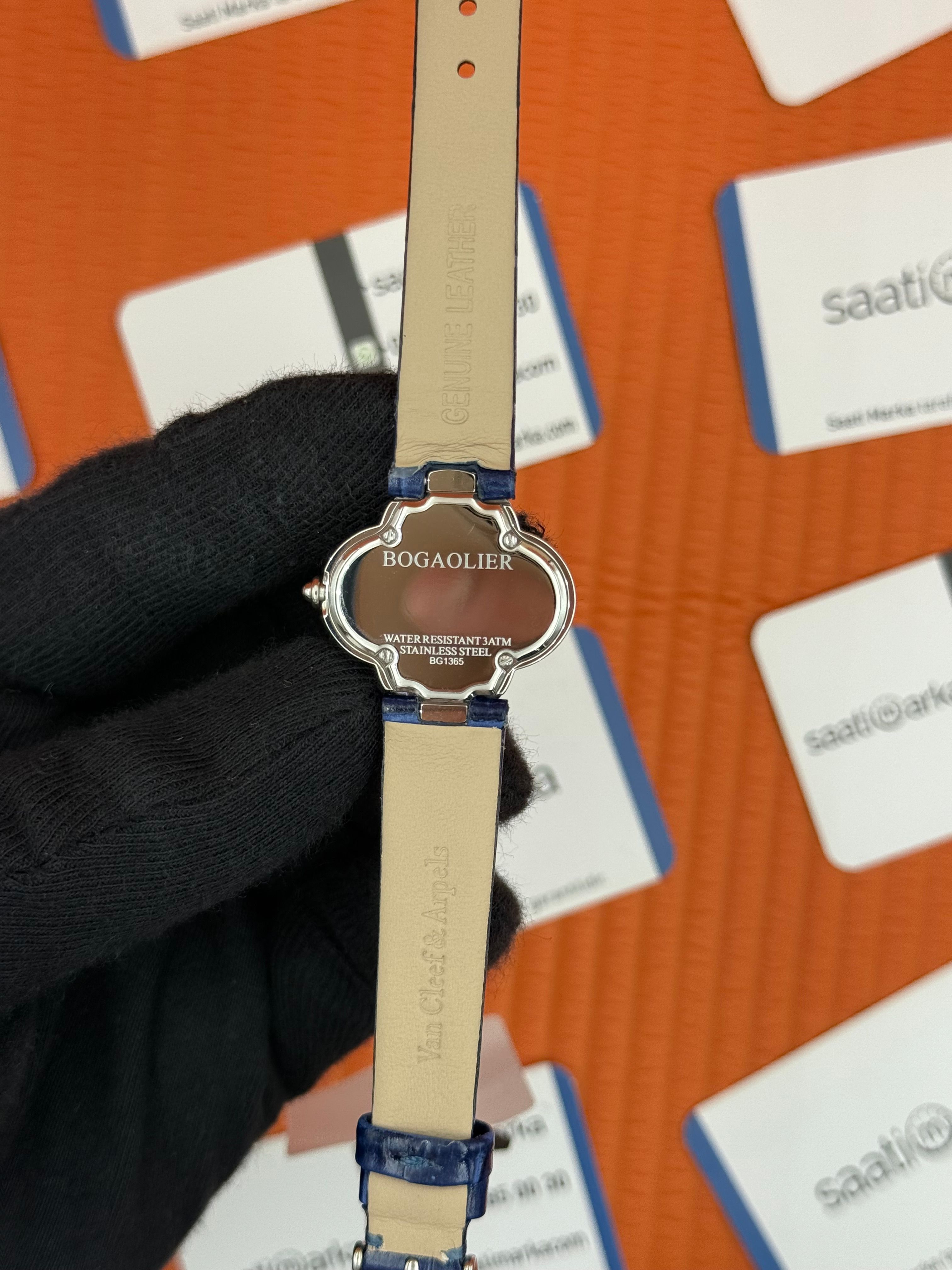 VAN CLEEF beyaz kadran lacivert deri kordon silver kasa taşlı bezel kadın kol saati