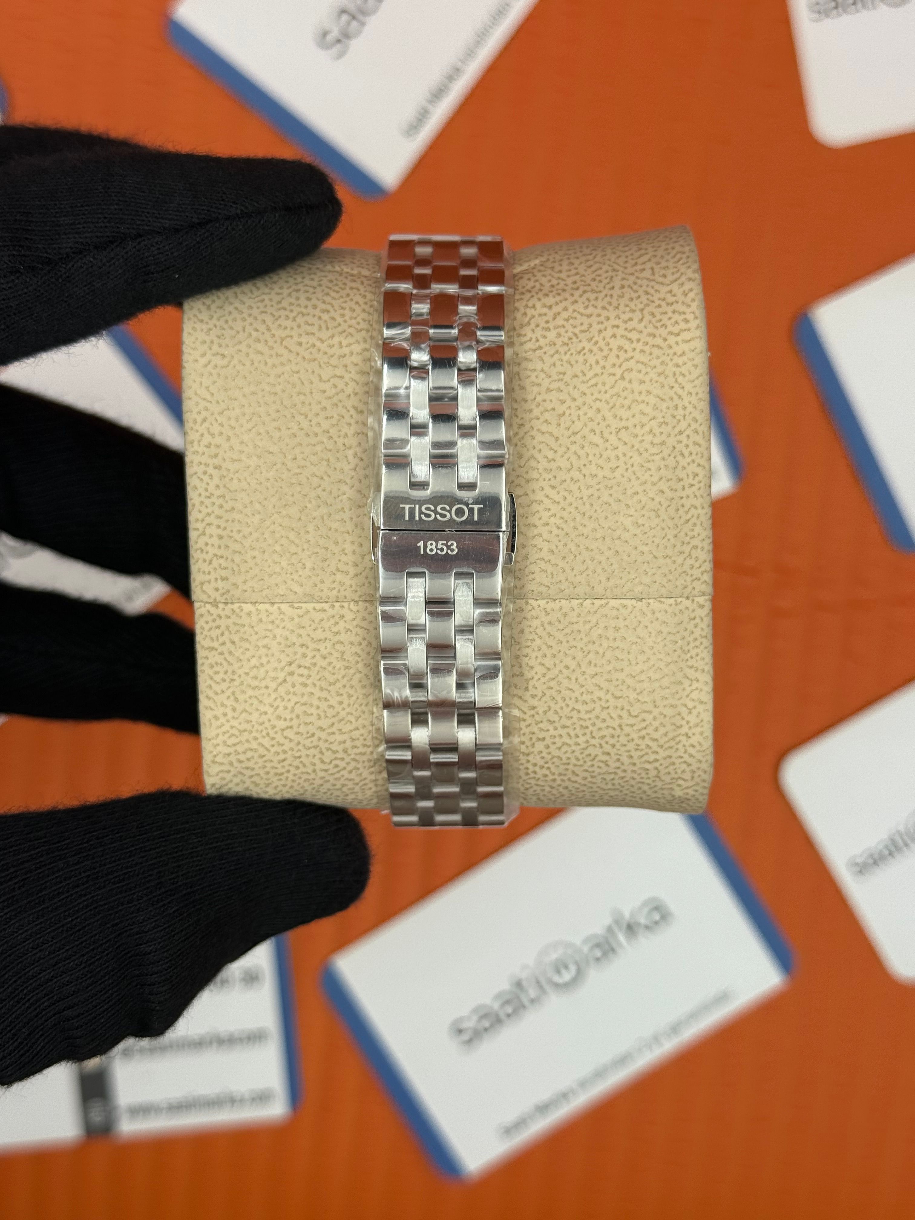 TISSOT beyaz baget taşllı kadran silver kasa kordon kadın kol saati