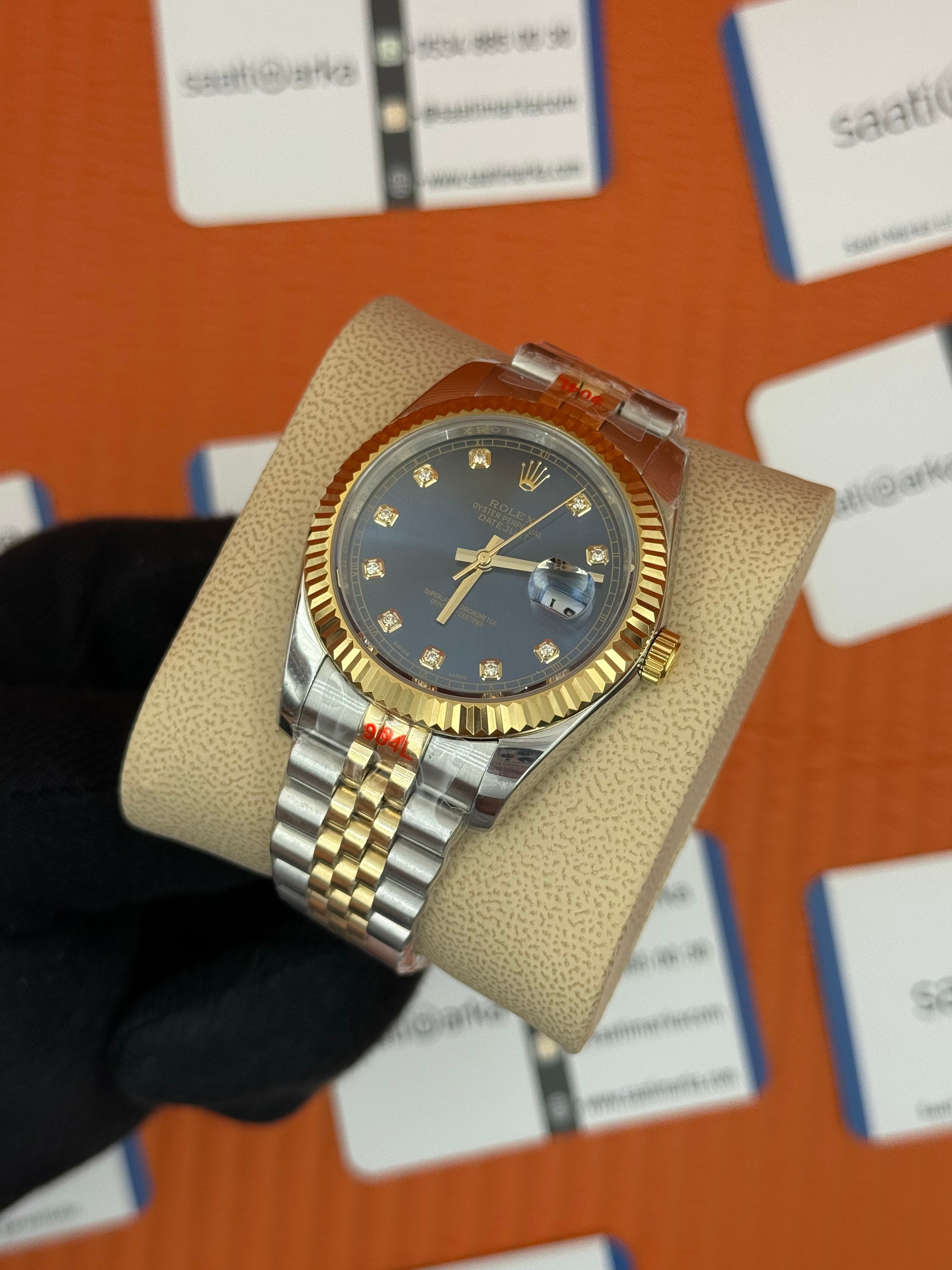 ROLEX Datejust baget taşlı blue dial gold-silver jubilee kordon