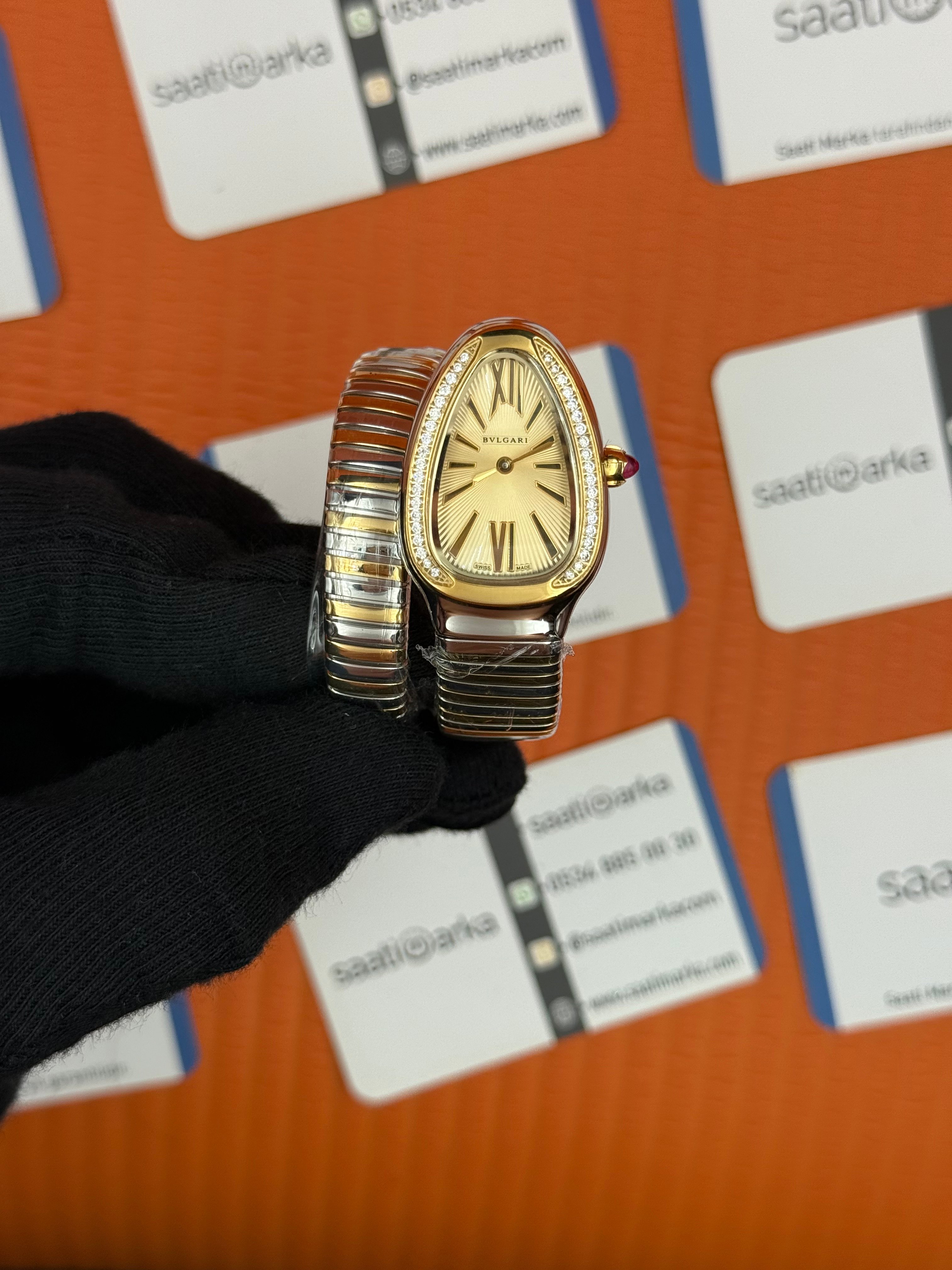 BVLGARİ serpenti tek sarma gold silver kordon taşlı bezel şampanya kadran kadın kol saati