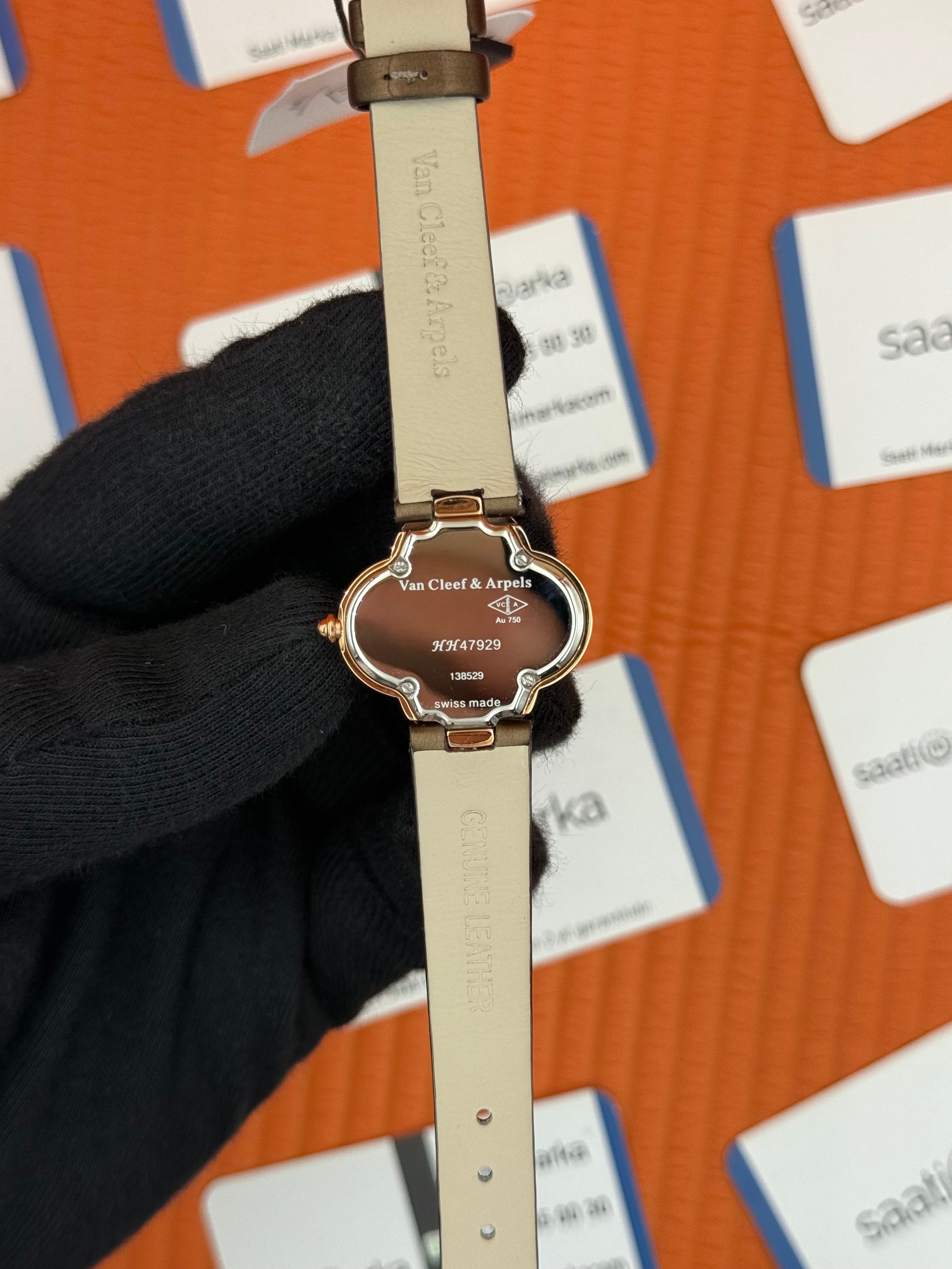 VAN CLEEF beyaz kadran kahverengi deri kordon taşlı bezel kadın kol saati