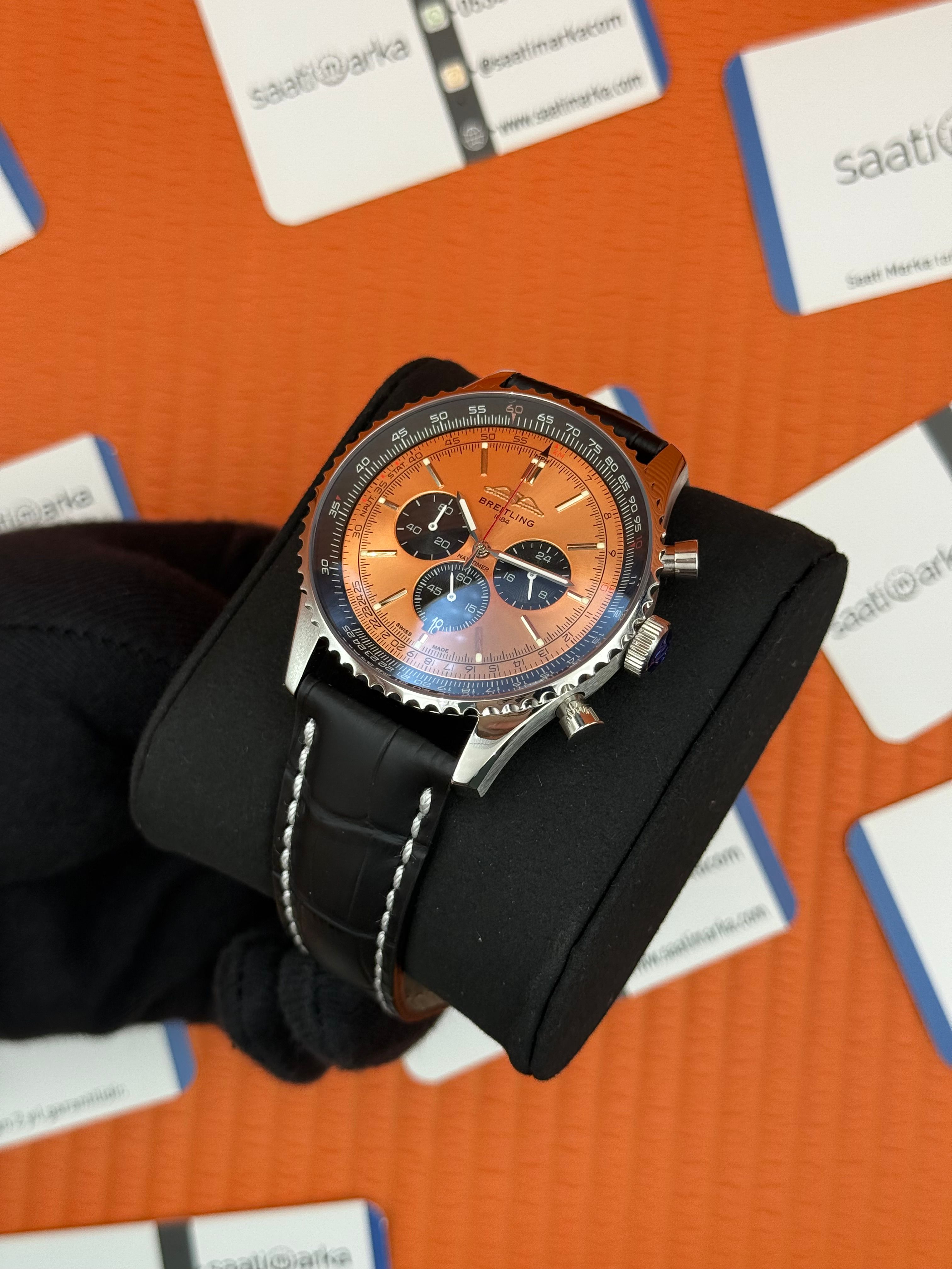 BREITLING Navitimer siyah deri kordon turuncu kadran çelik kasa 
