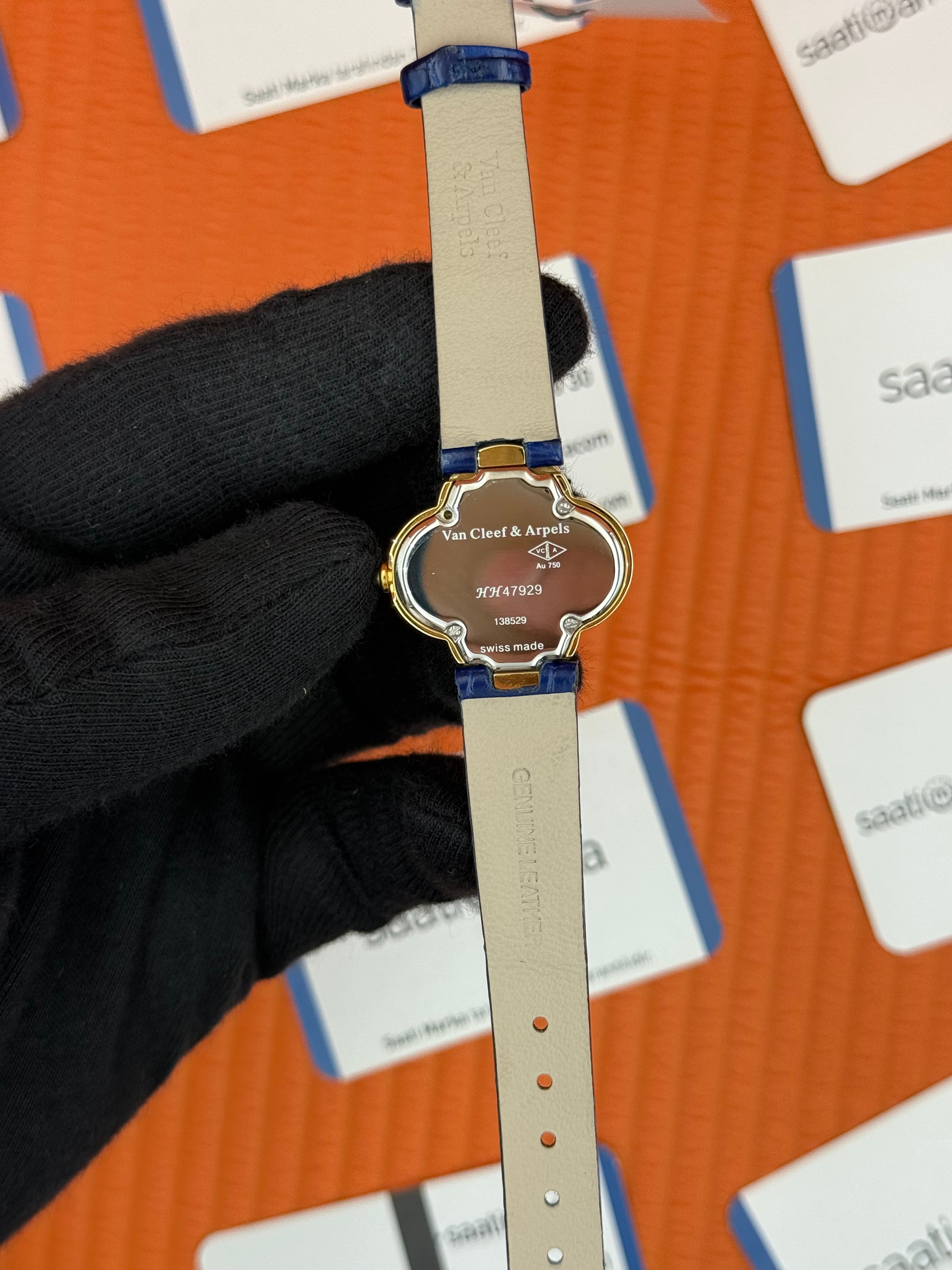 VAN CLEEF lacivert kadran lacivert deri kordon gold kasa taşlı bezel kadın kol saati