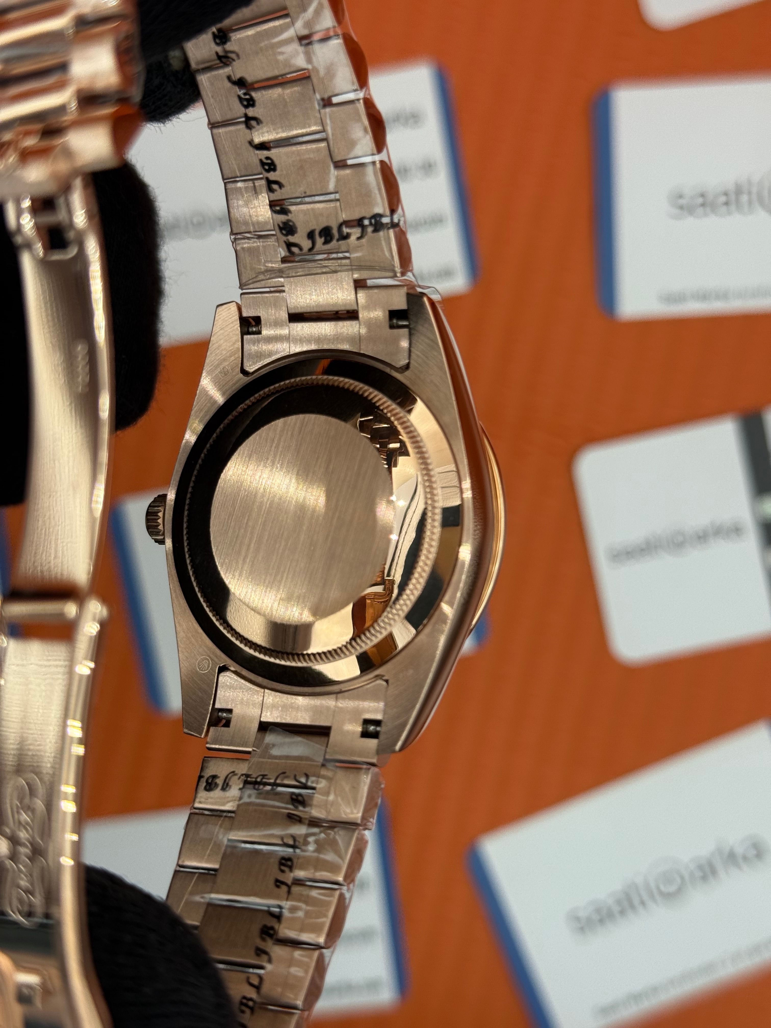 ROLEX Day Date taşlı bezel roma rakamlı chocolate kadran rose kasa-kordon oyster
