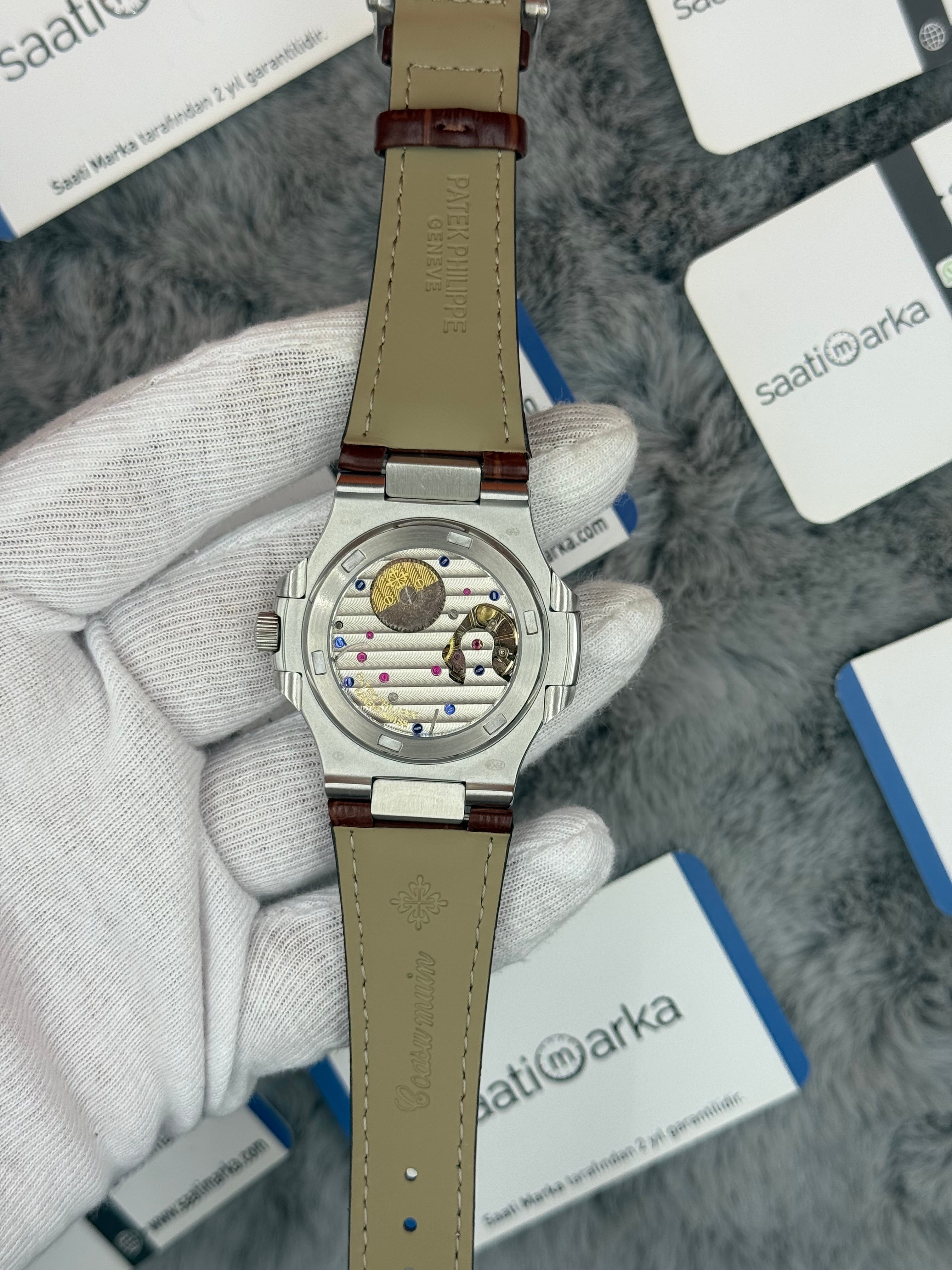PATEK PHİLİPPE nautilus moontphase 5712 taşlı bezel kahverengi kadran kahverengi deri kordon silver kasa 40mm erkek kol saati