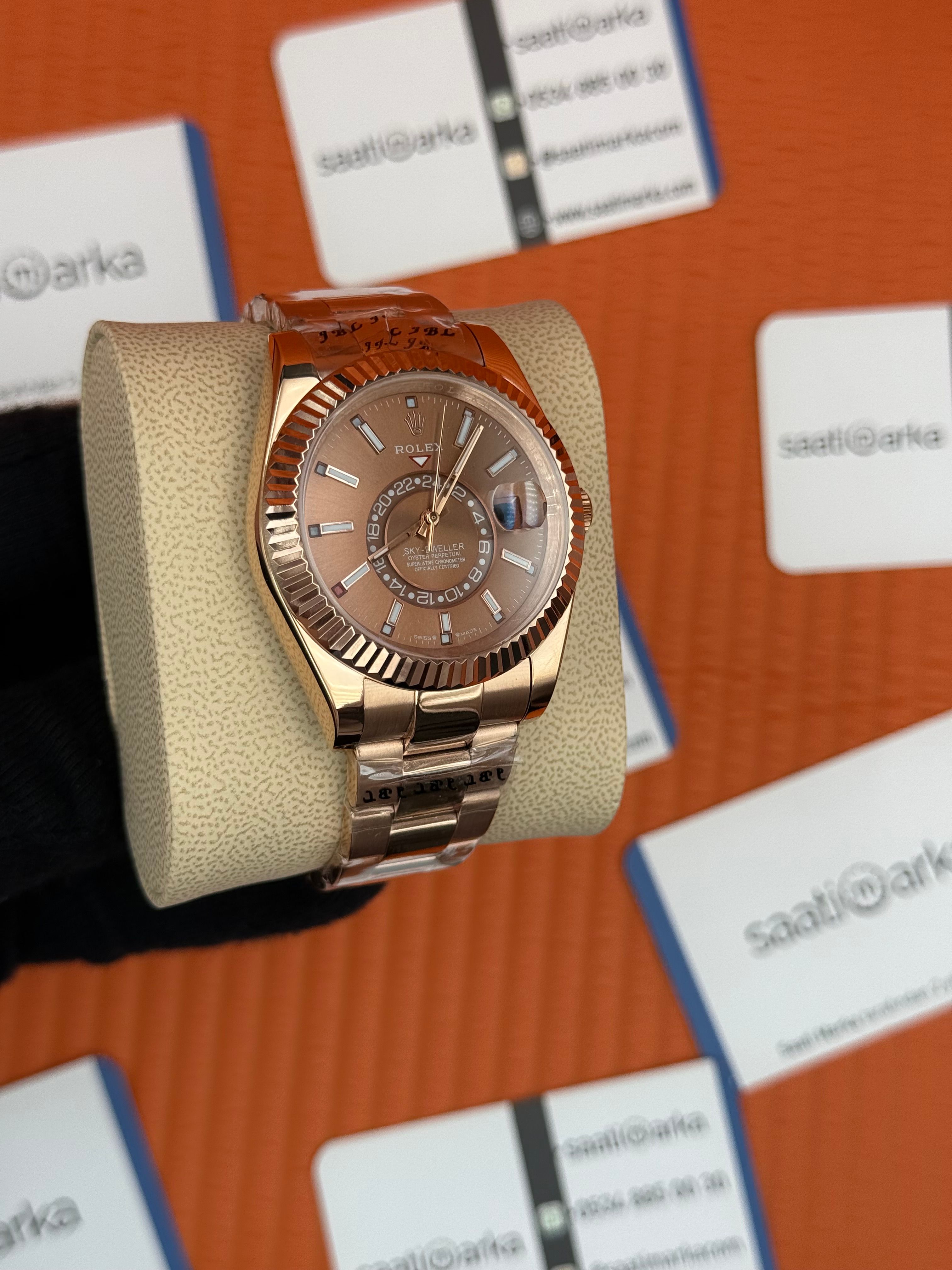 ROLEX Sky Dweller chocolate oyster kordon rose kasa-kordon
