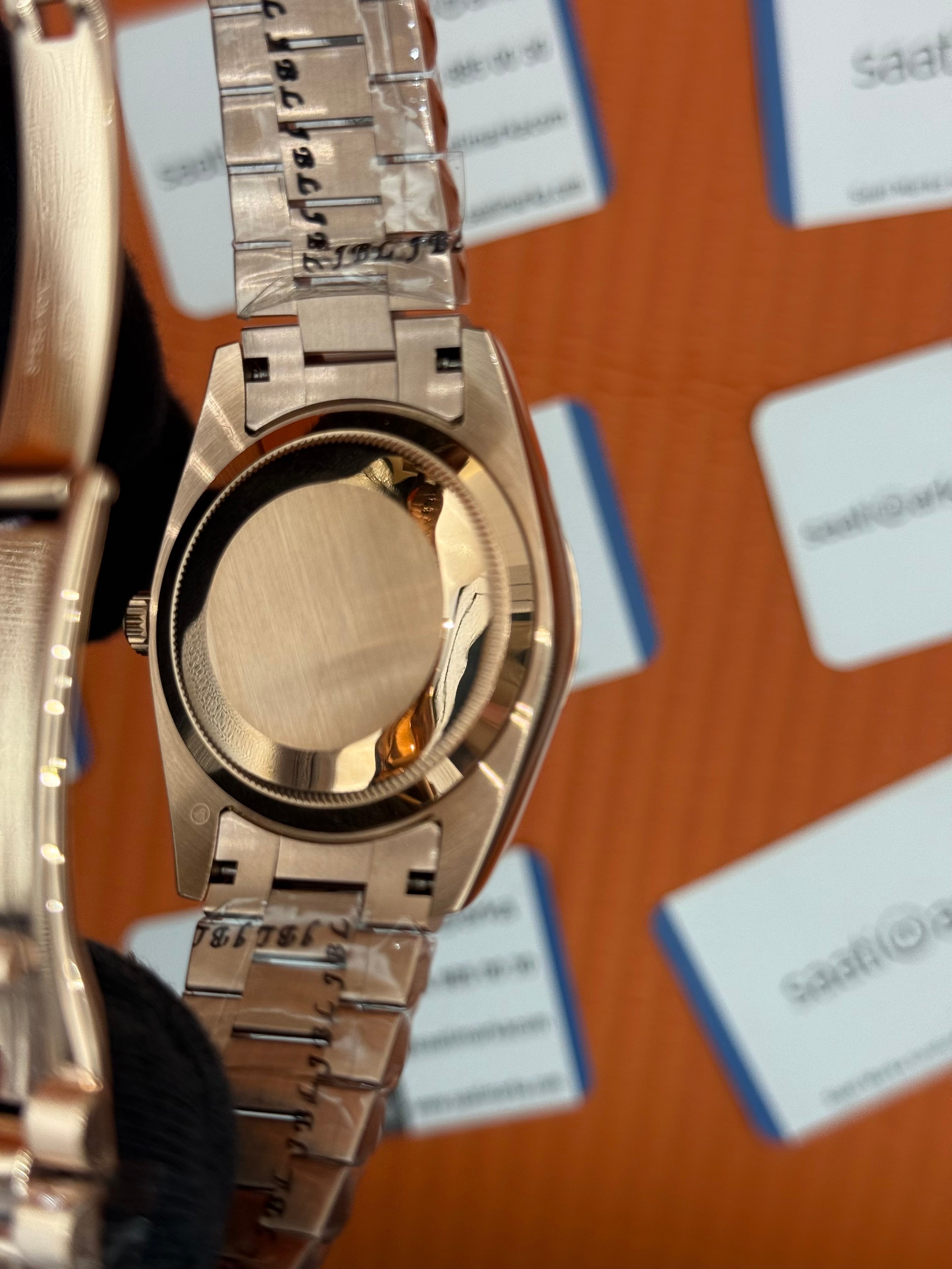 ROLEX Day Date roma rakamlı deep grey dial rose kasa-kordon oyster