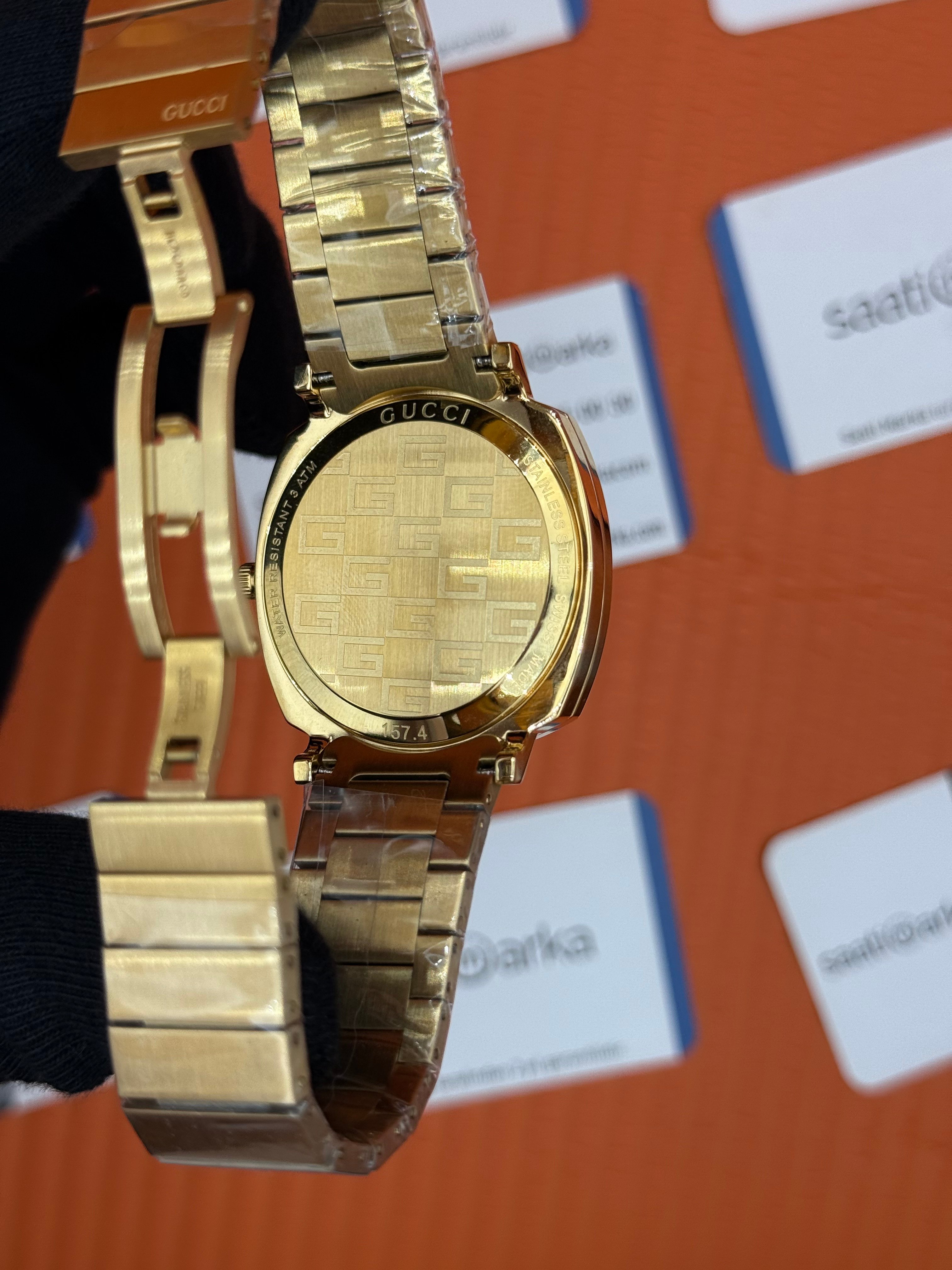GUCCI GRIP toz pembe kadran gold kordon kadın kol saati