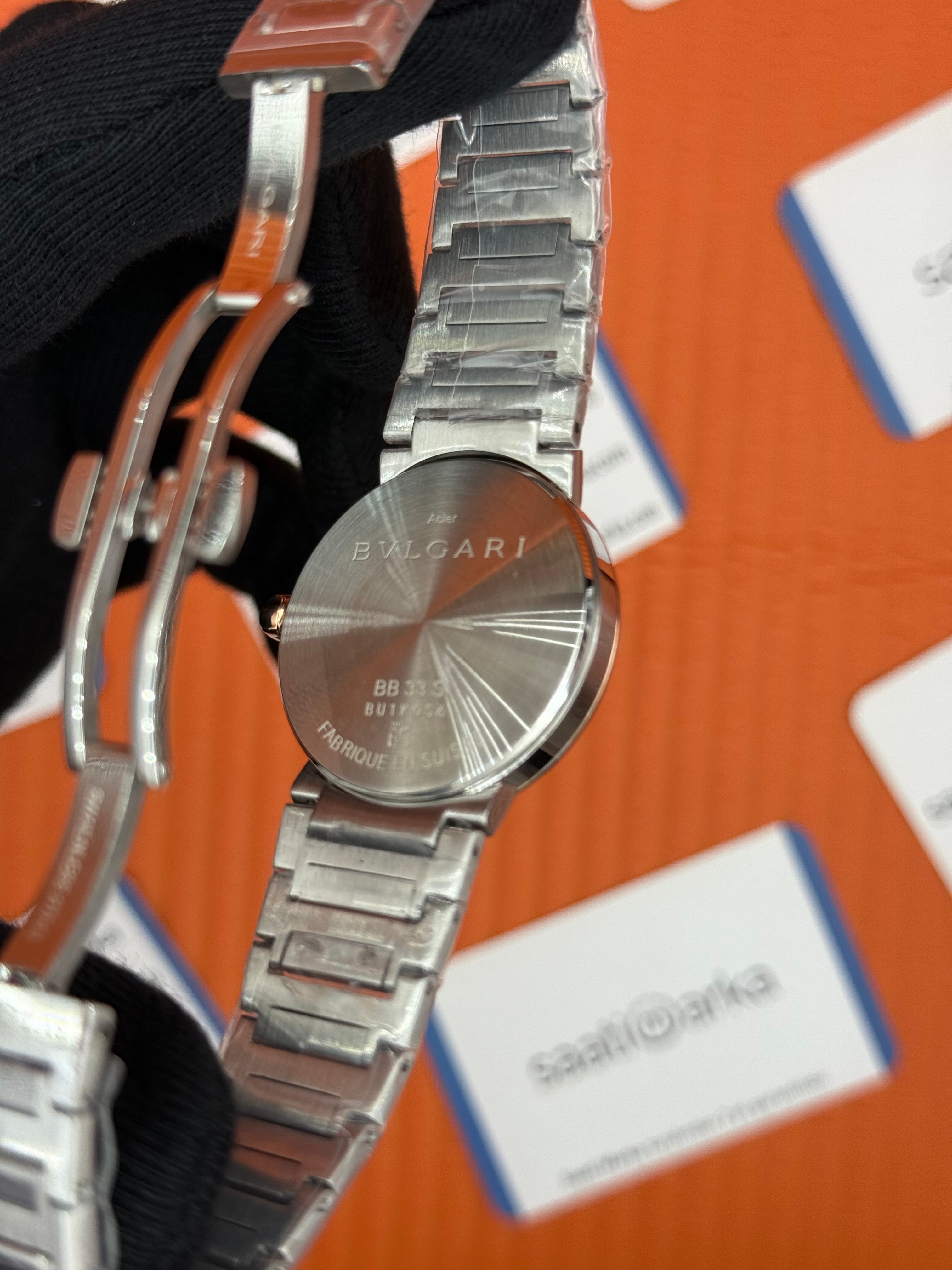 BVLGARI beyaz kadran rose yazılı bezel silver kasa kordon kadın kol saati