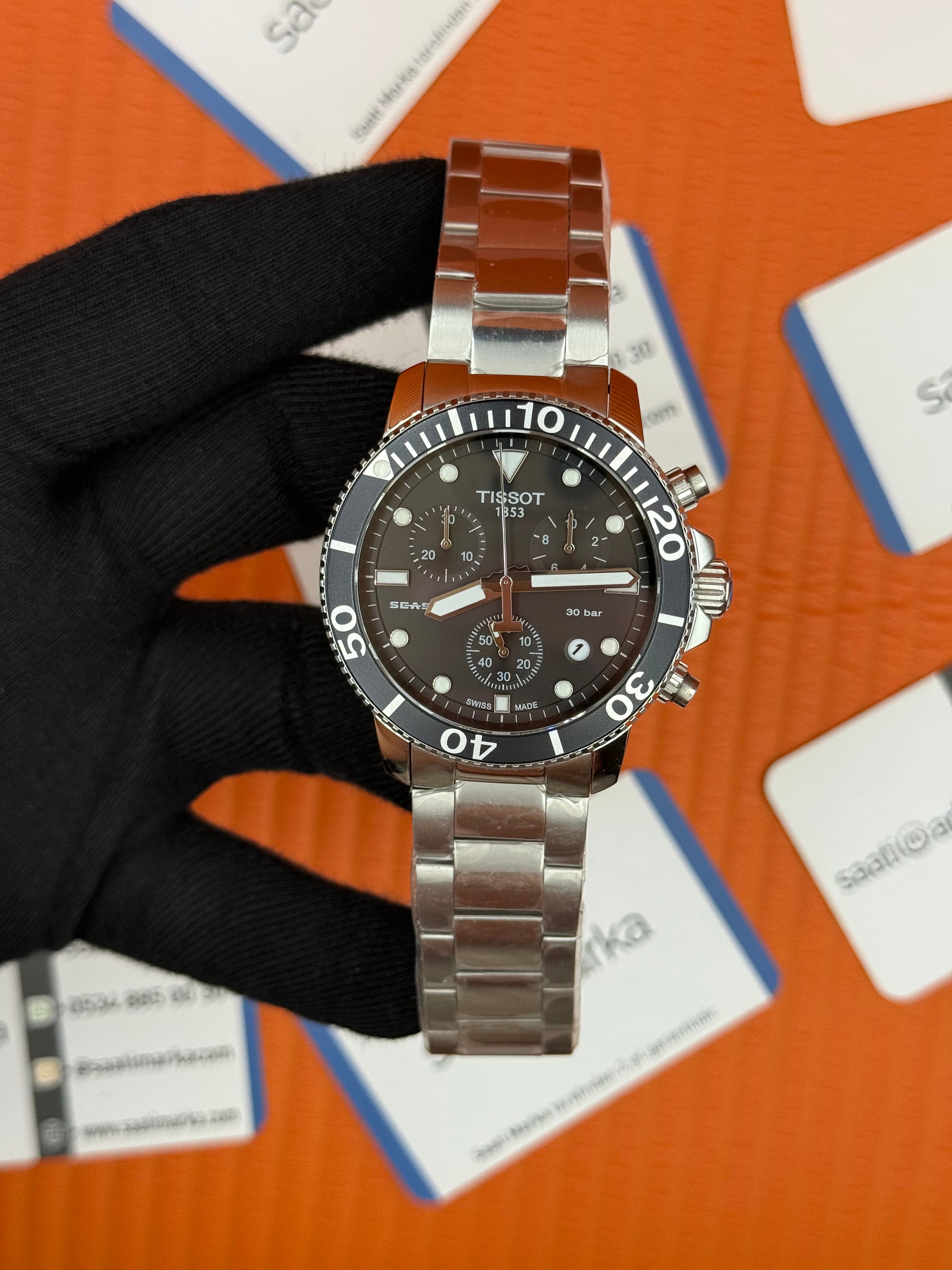 TISSOT siyah kadran silver kasa kordon erkek kol saati