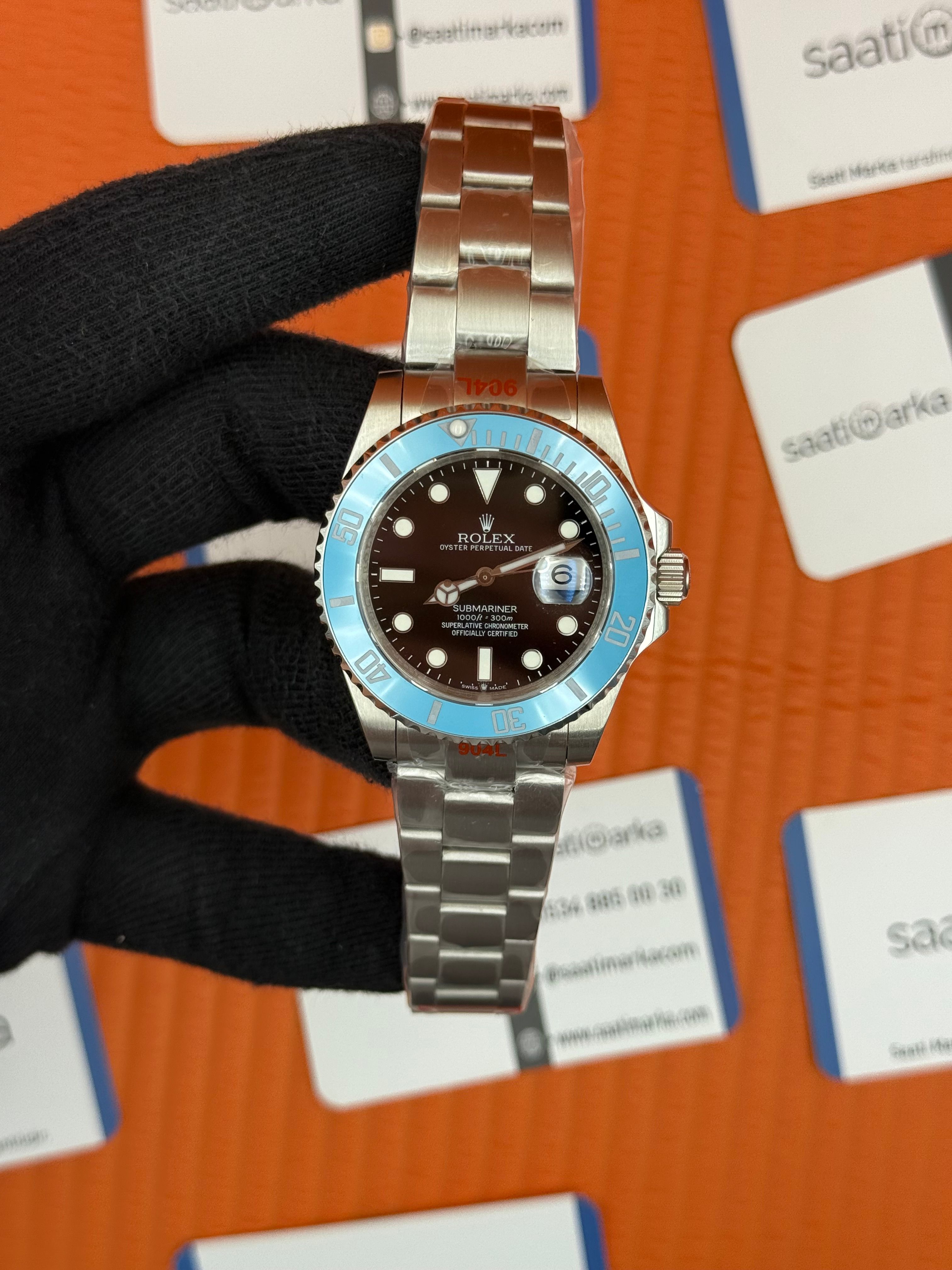 ROLEX Submariner black dial turquoise bezel silver oyster kordon