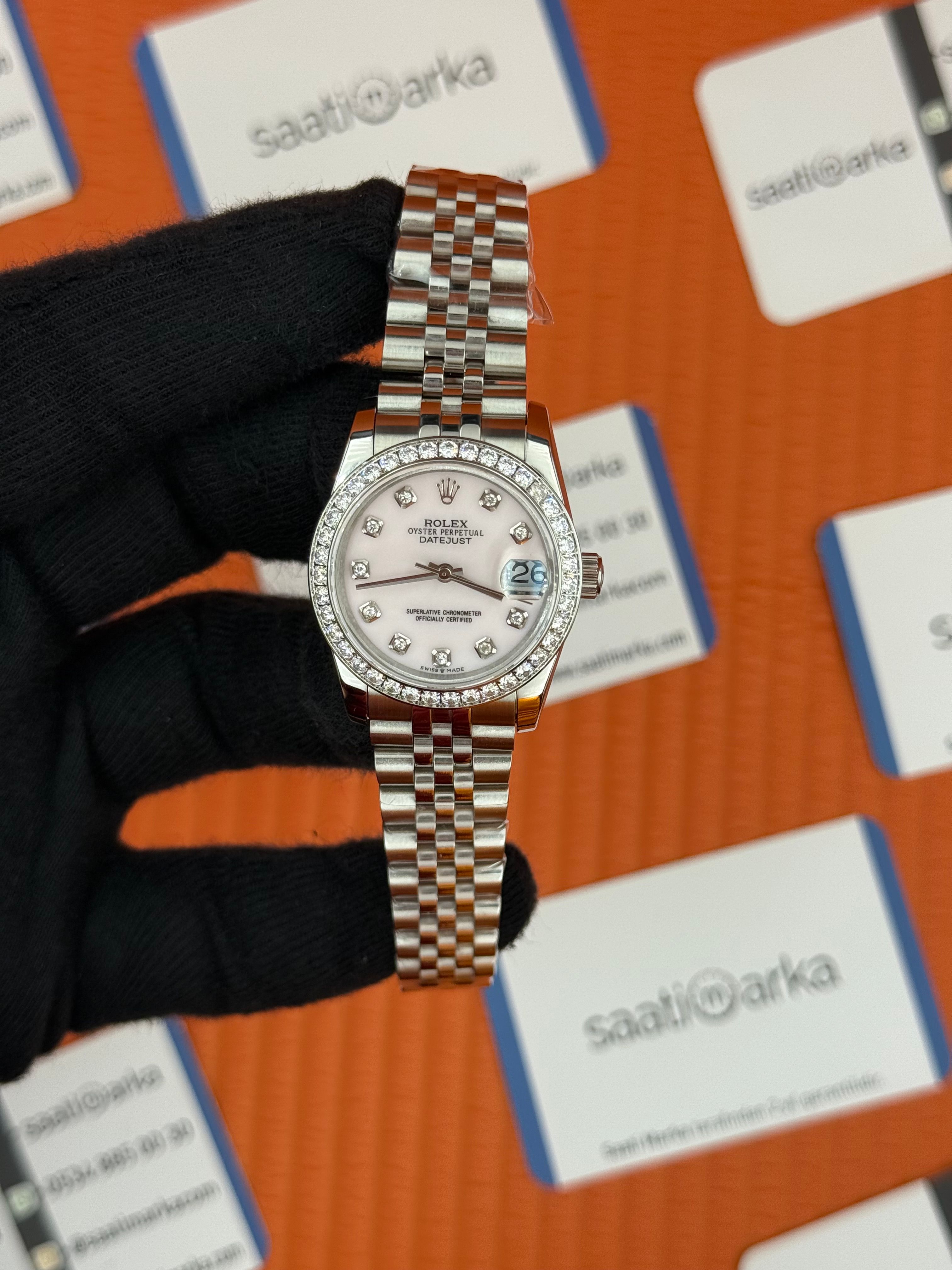 ROLEX datejust 31mm toz pembe kadran silver jubilee kordon taşlı bezel 
