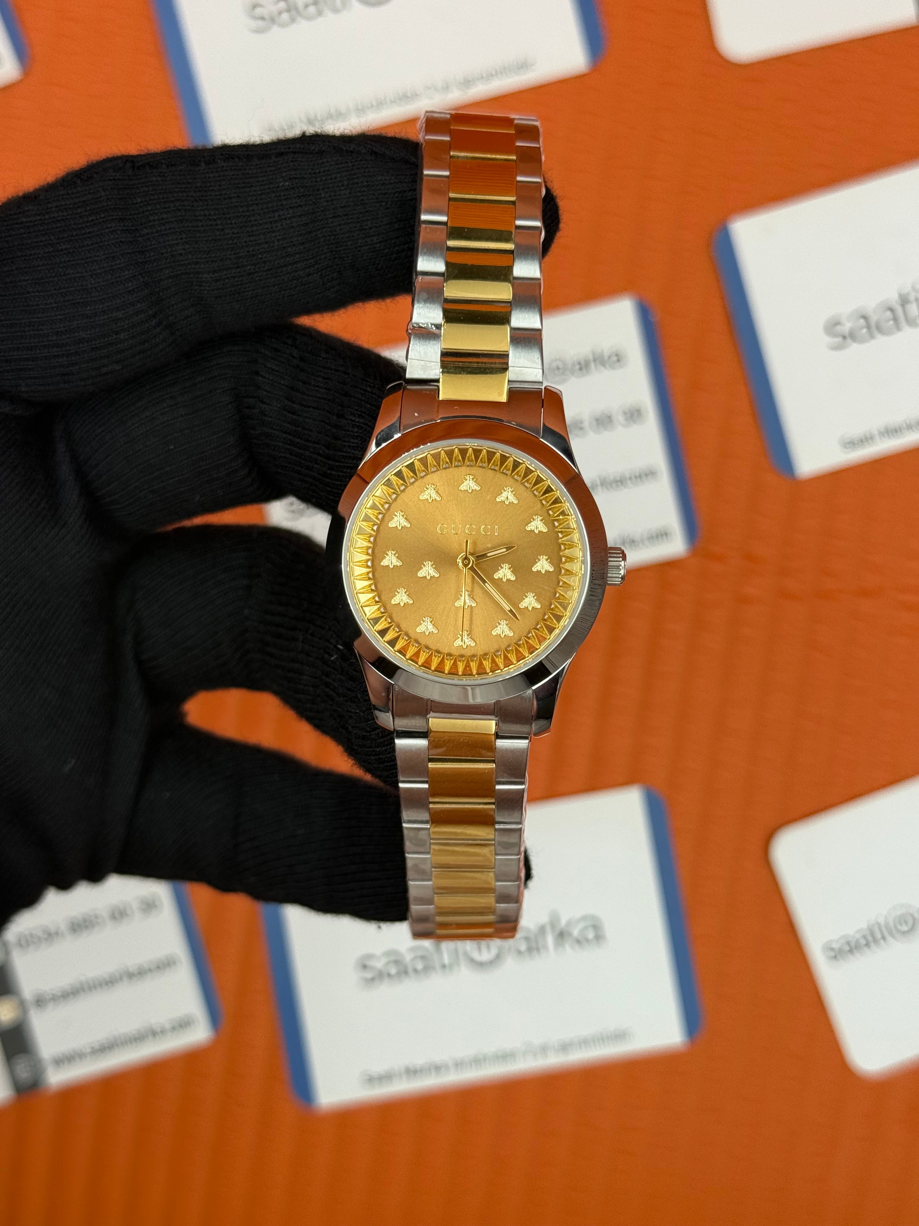 GUCCI sarı kadran gold silver kasa-kordon kadın kol saati