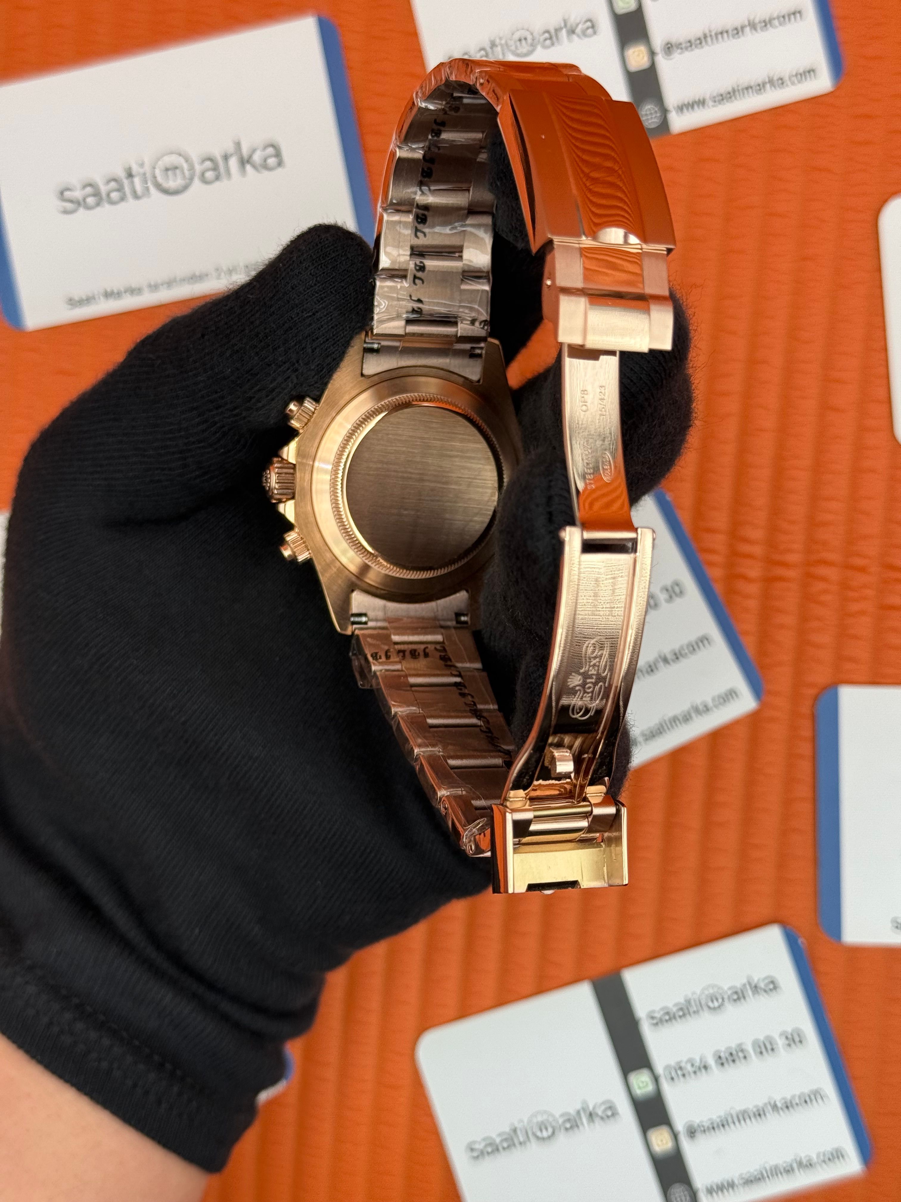 ROLEX Daytona black dial rose kasa-kordon