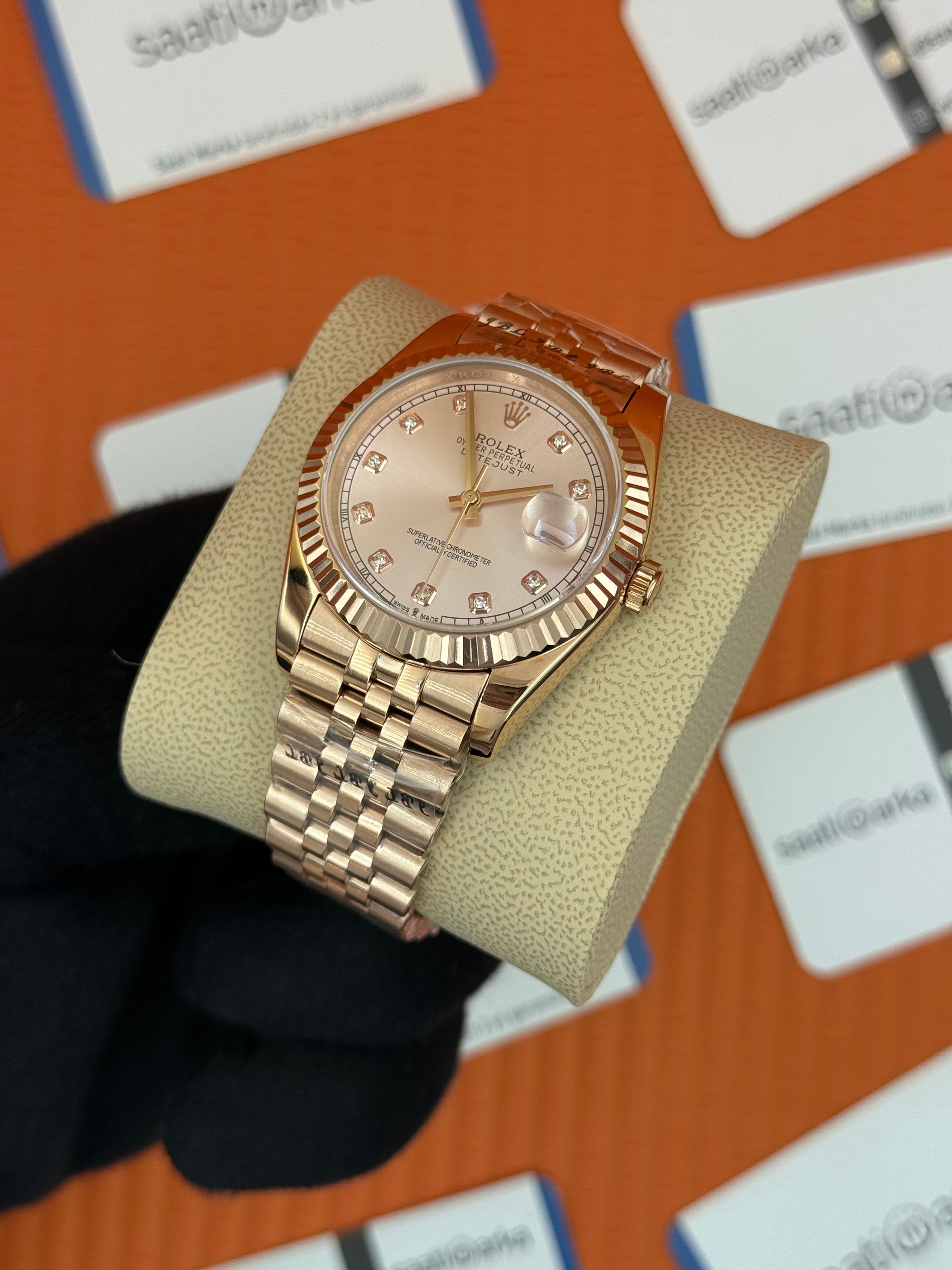 ROLEX Datejust baget taşlı rose dial rose jubilee kordon