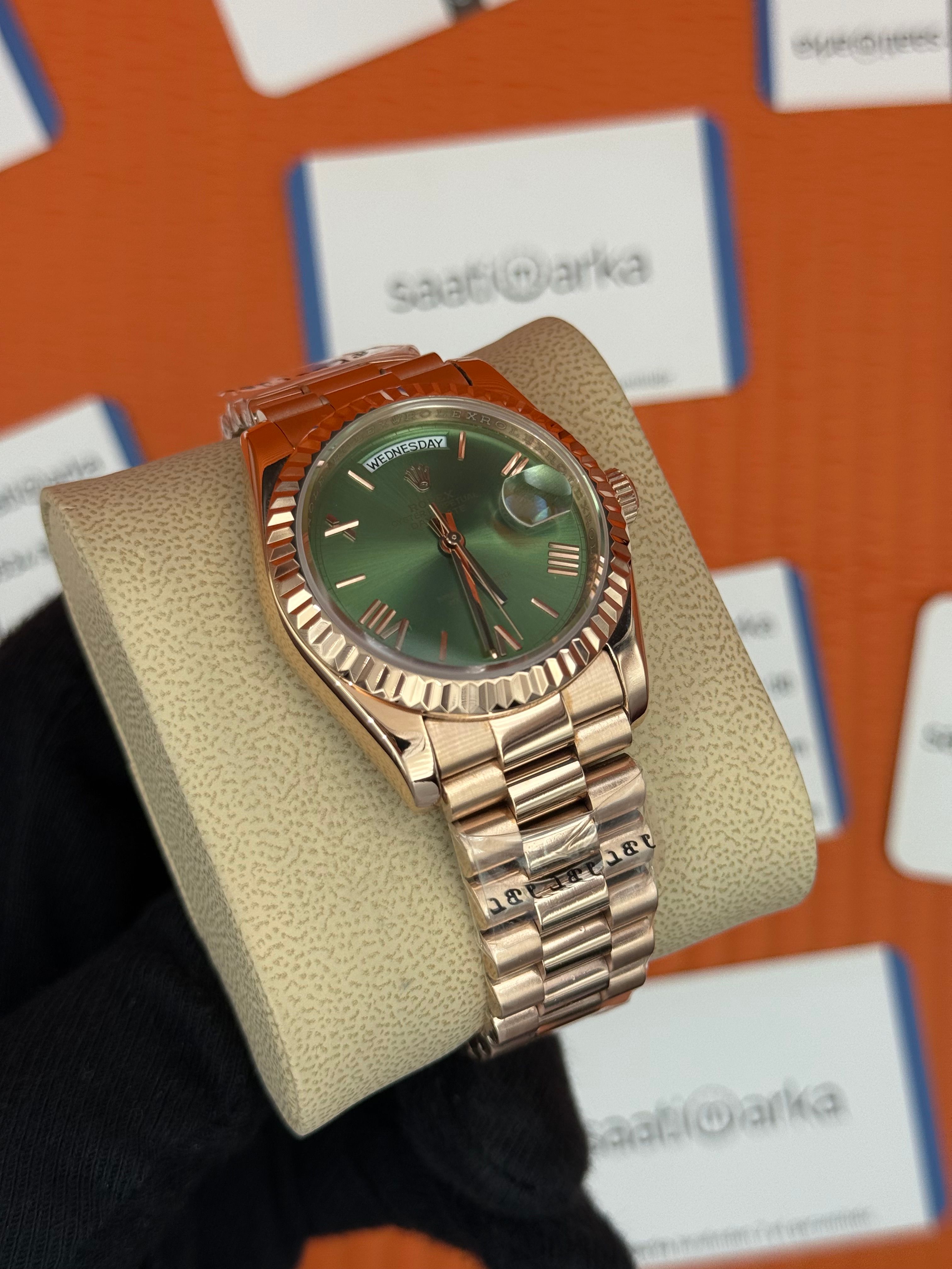 ROLEX day date 36mm yeşil roma rakamlı kadran rose kasa-kordon president 