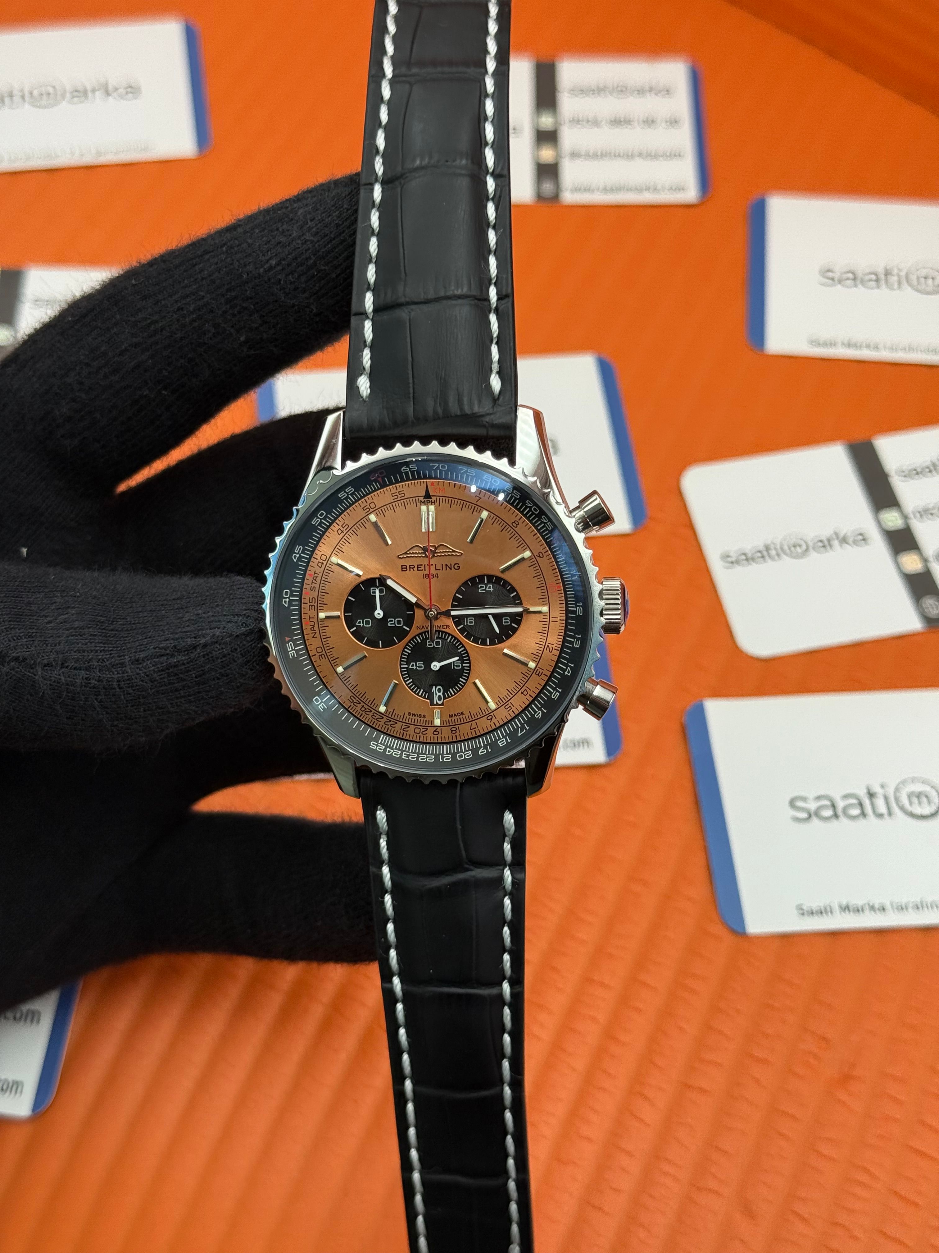 BREITLING Navitimer siyah deri kordon turuncu kadran çelik kasa 