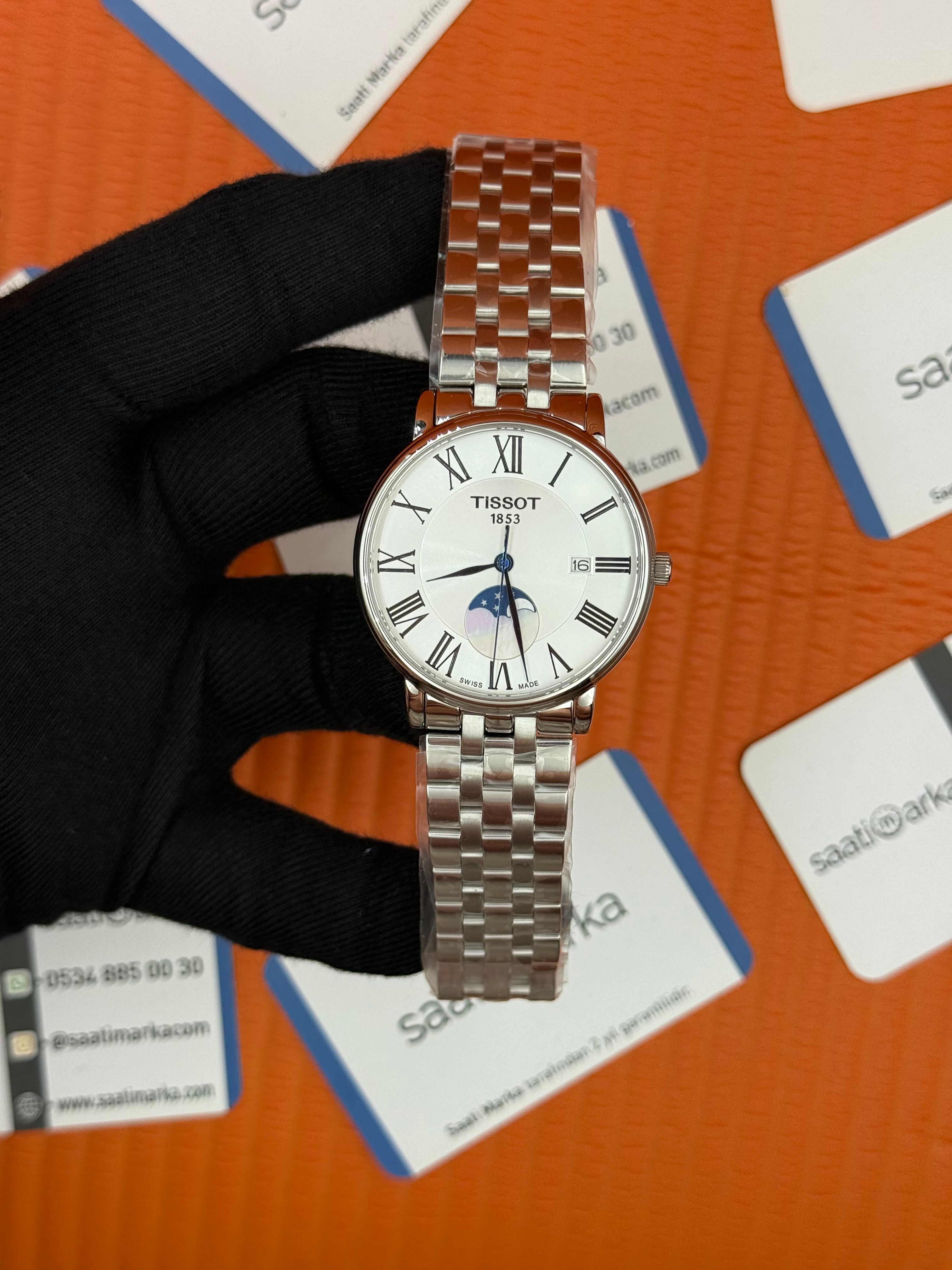 TISSOT carson premium gent moonphase beyaz kadran silver jubile kordon erkek kol saati