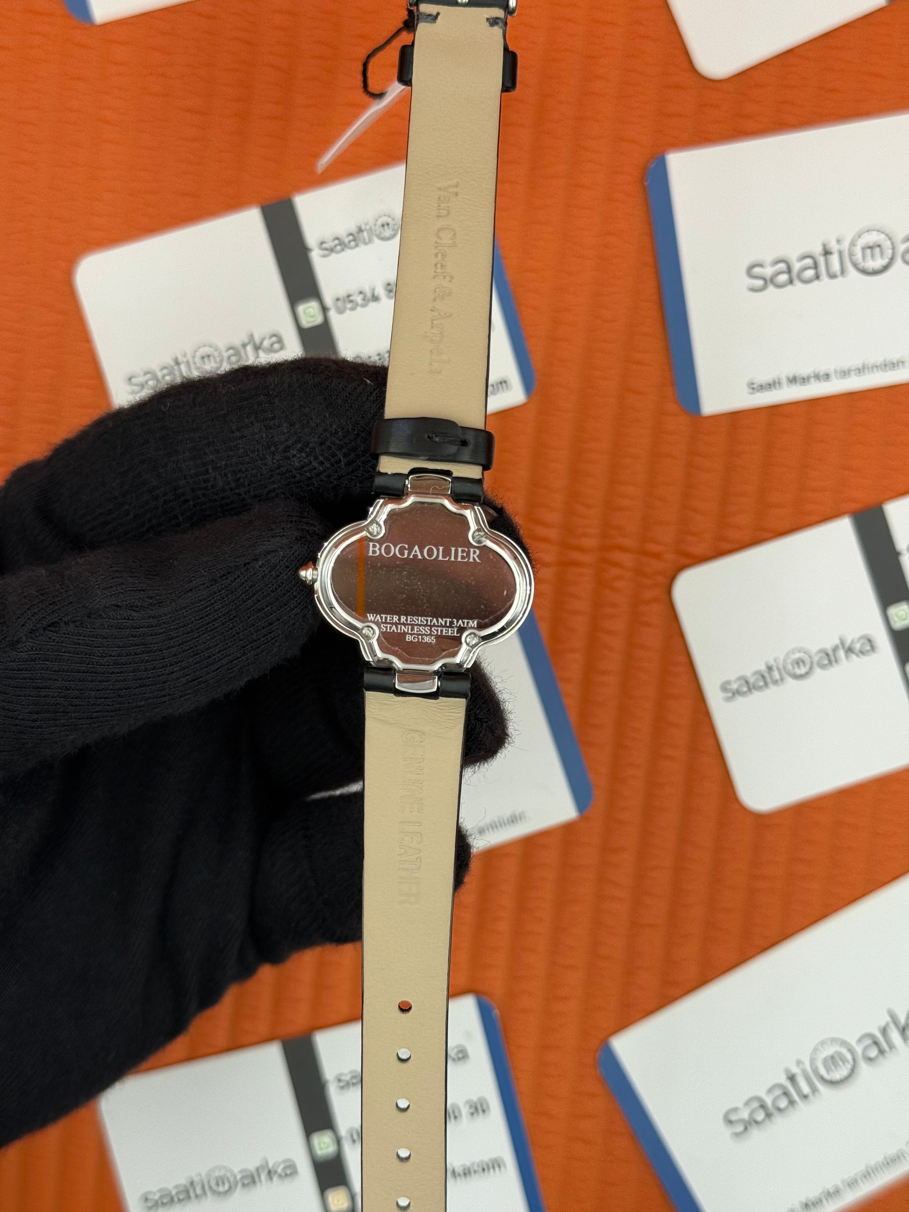 VAN CLEEF siyah kadran taşlı bezel deri kordon kadın kol saati 
