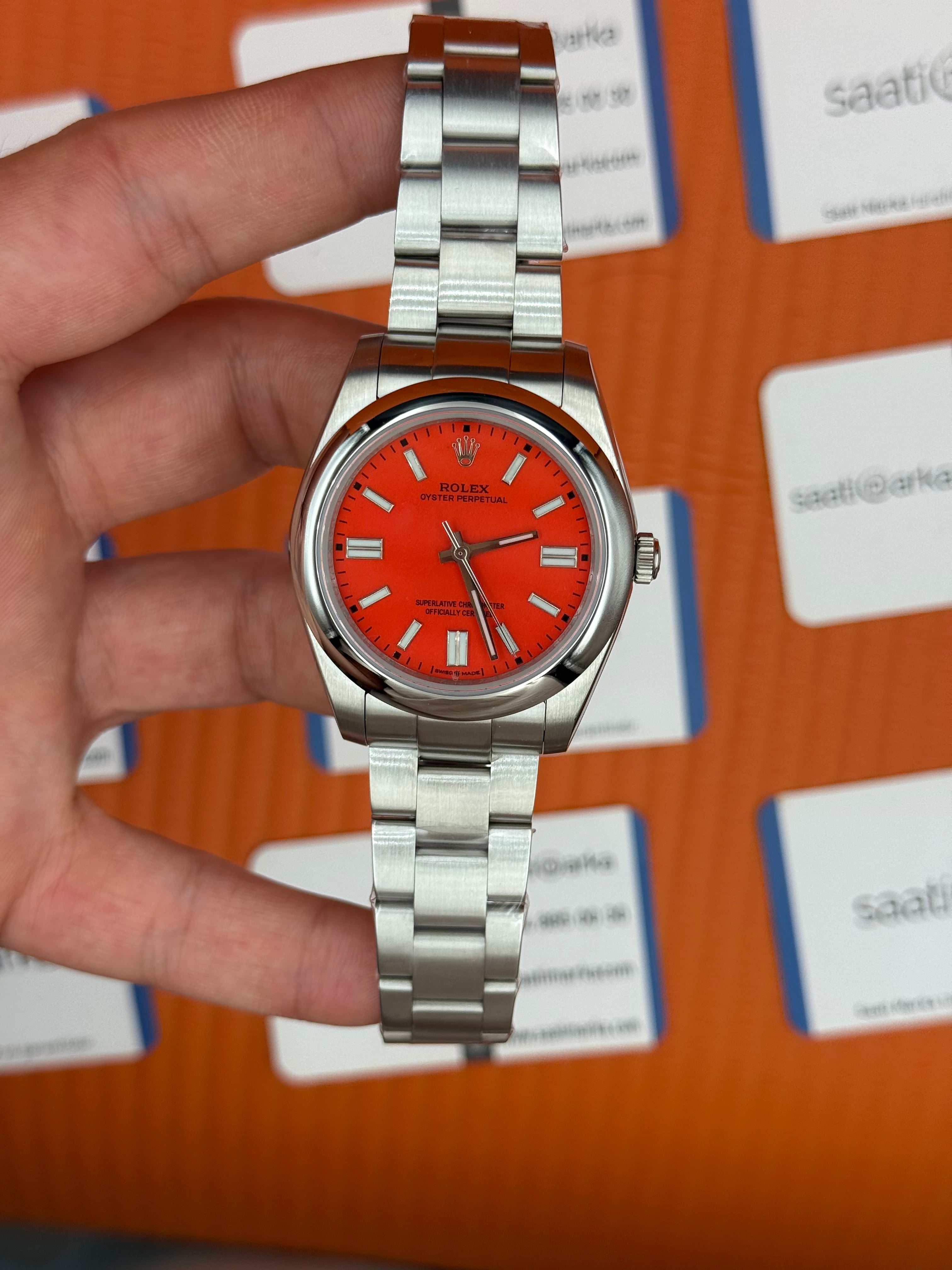 ROLEX oyster perpetual kırmızı kadran silver kasa kordon erkek kol saati