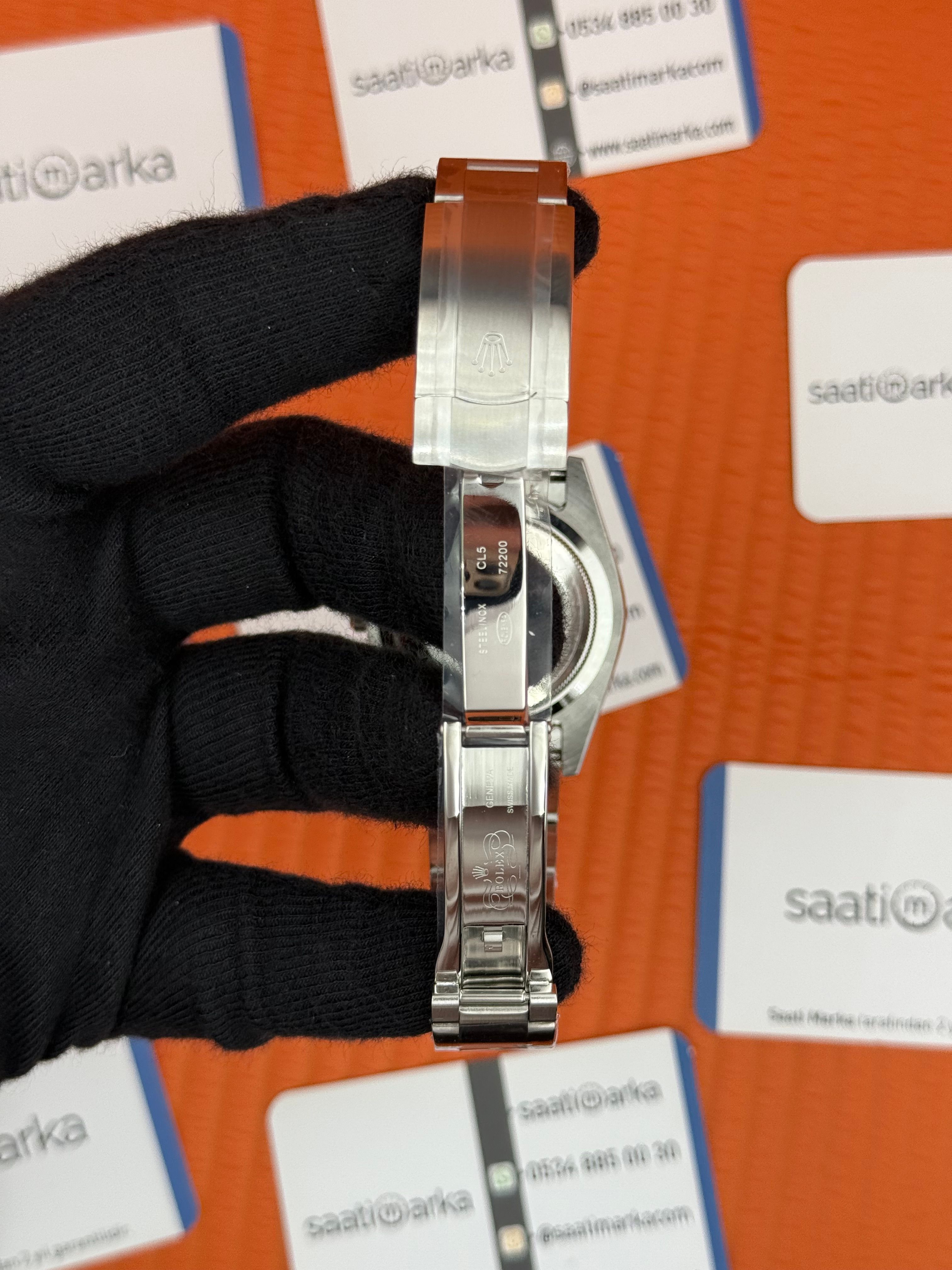 ROLEX OYSTER Perpetual pink dial silver kasa-kordon