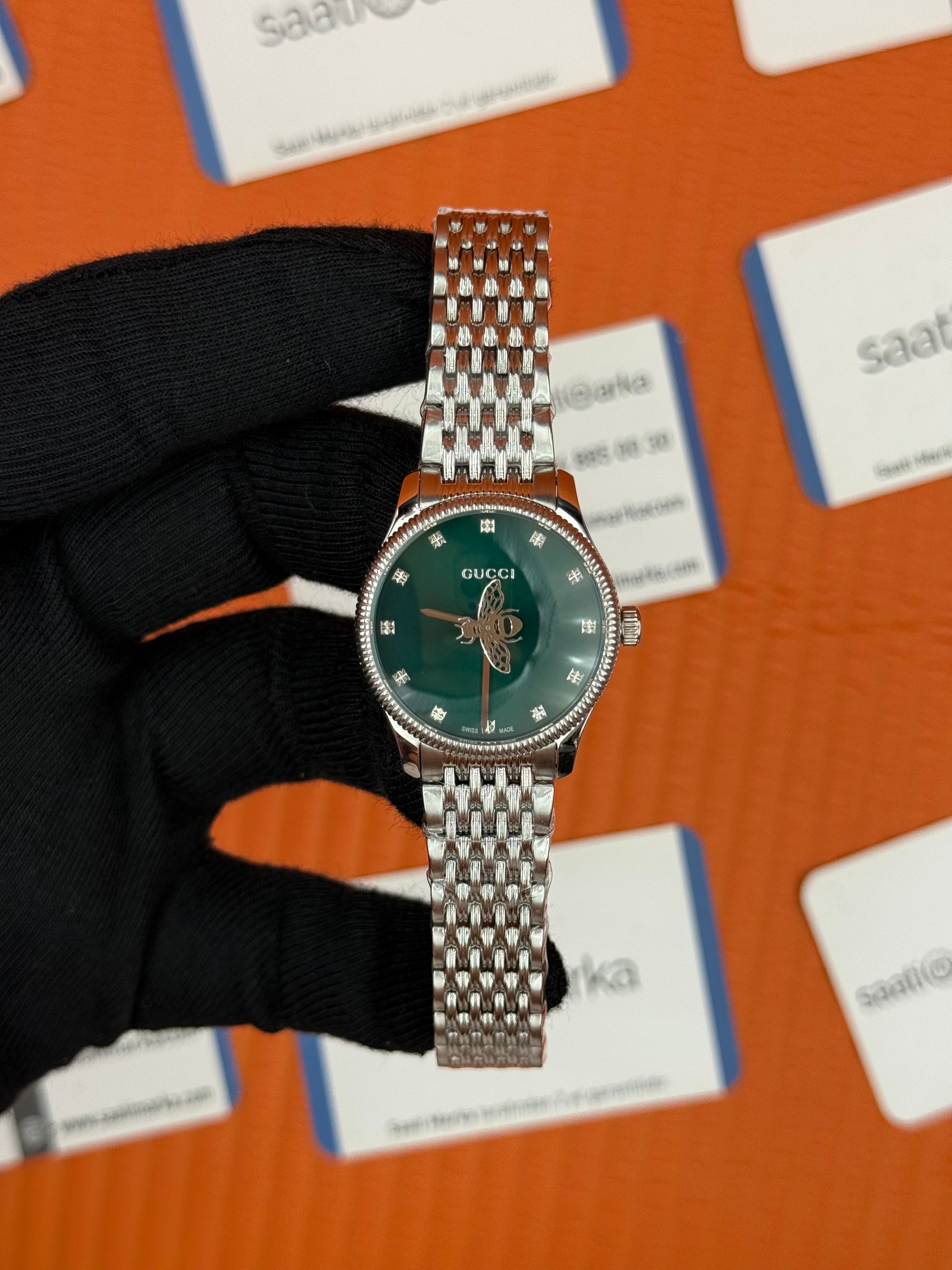 GUCCI yeşil kadran silver kasa kordon kadın kol saati