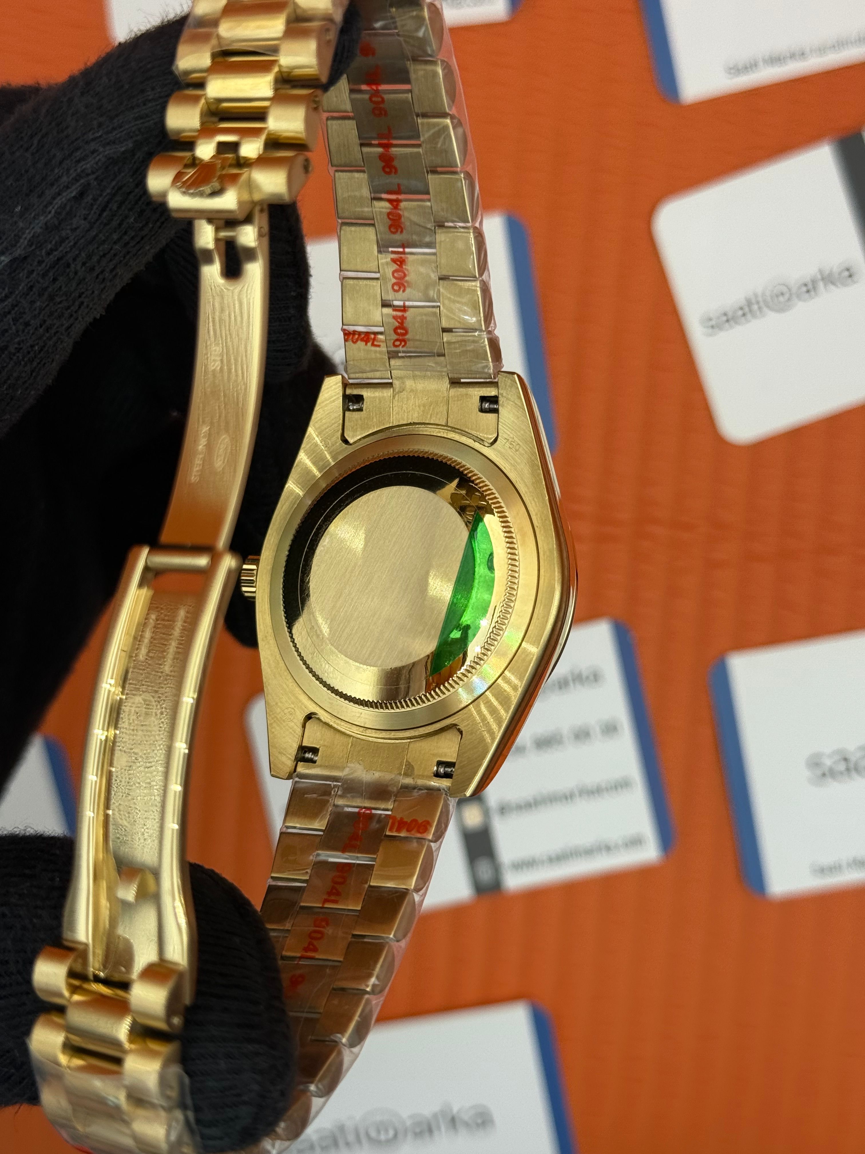 ROLEX Day Date taşlı bezel black dial gold president kordon