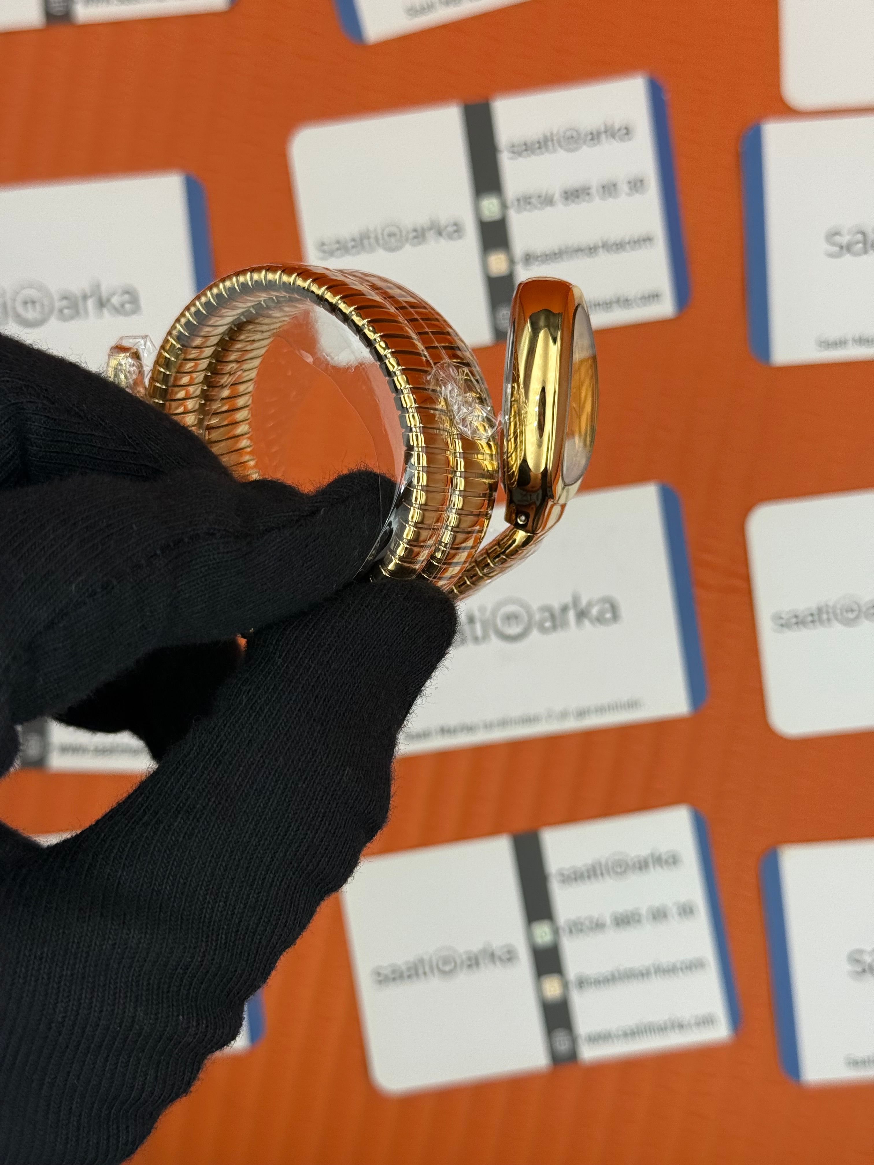 BVLGARİ serpenti çift sarma gold kordon şampanya kadran kadın kol saati