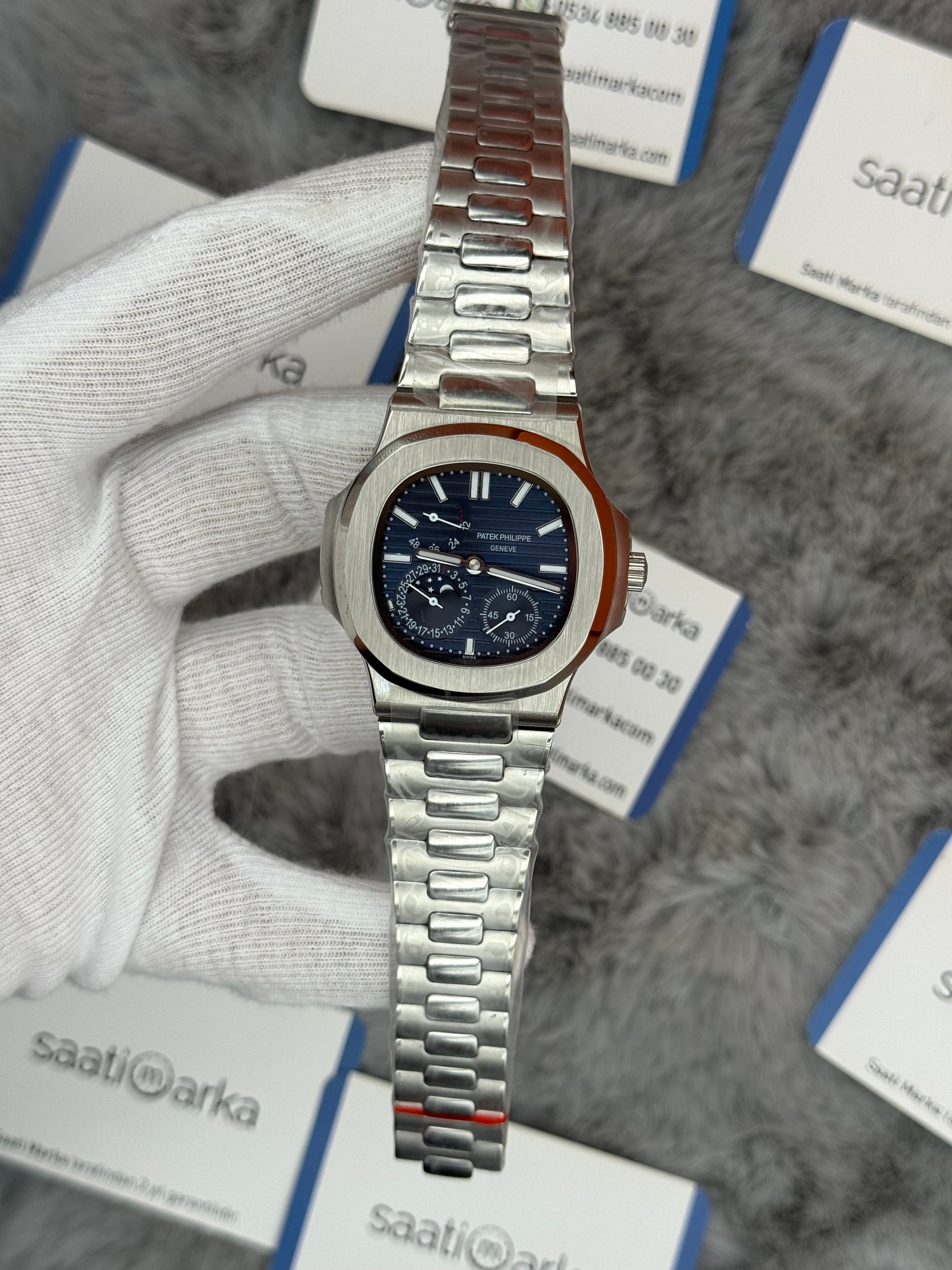 PATEK PHİLİPPE nautilus moontphase 5712 mavi kadran silver kasa kordon 40mm erkek kol saati
