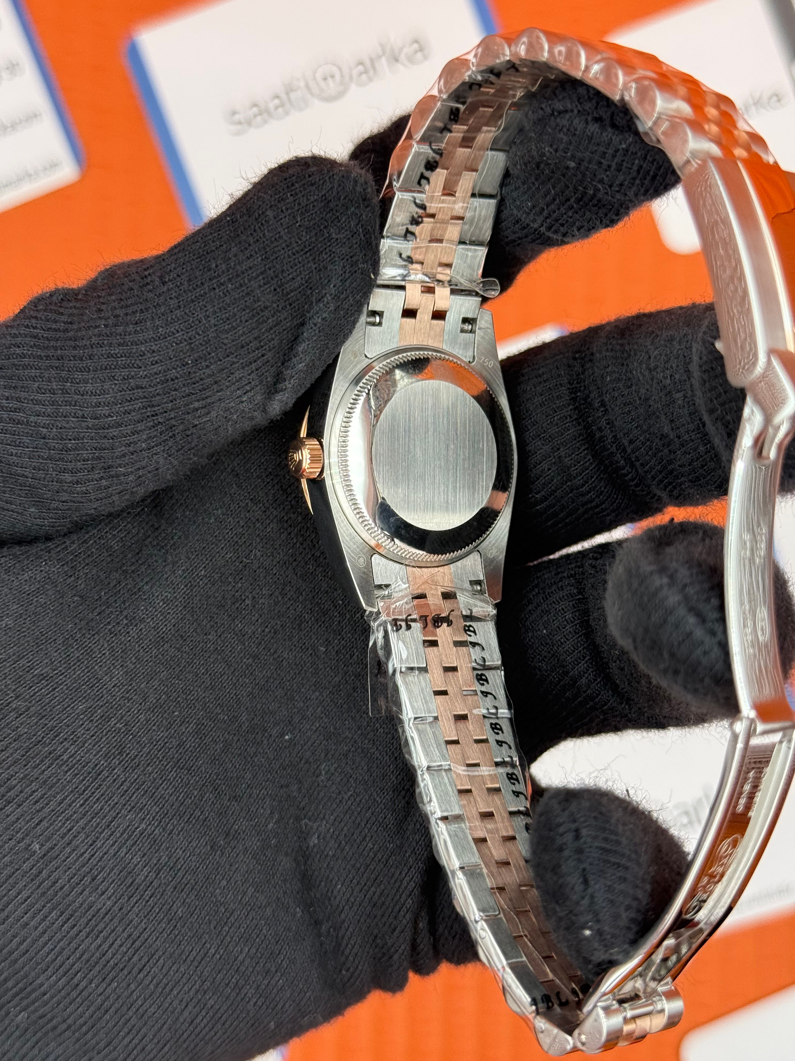 ROLEX datejust 31mm beyaz roma rakamlı kadran rose silver jubilee kordon