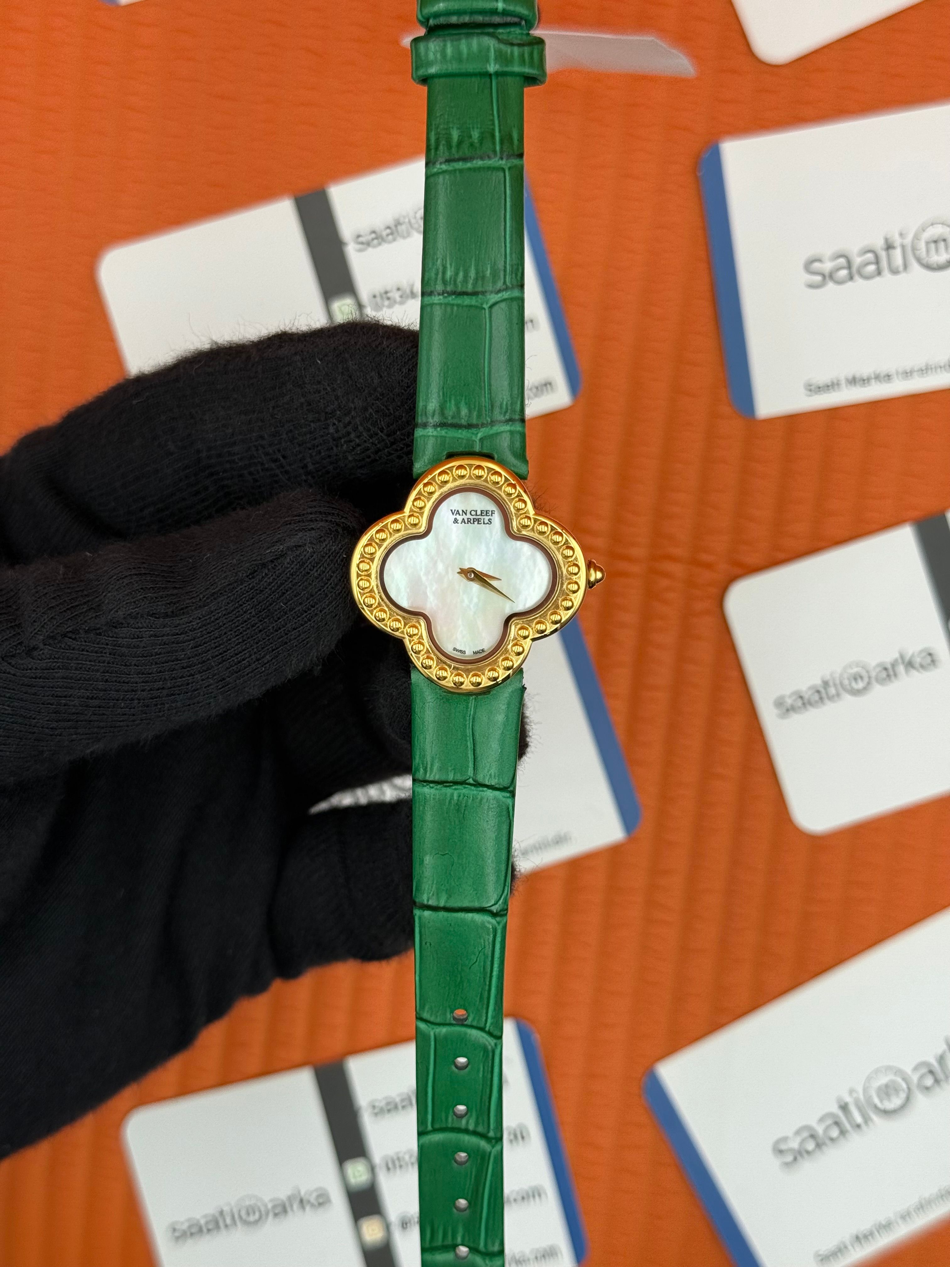 VAN CLEEF beyaz kadran yeşil deri kordon gold kasa kadın kol saati