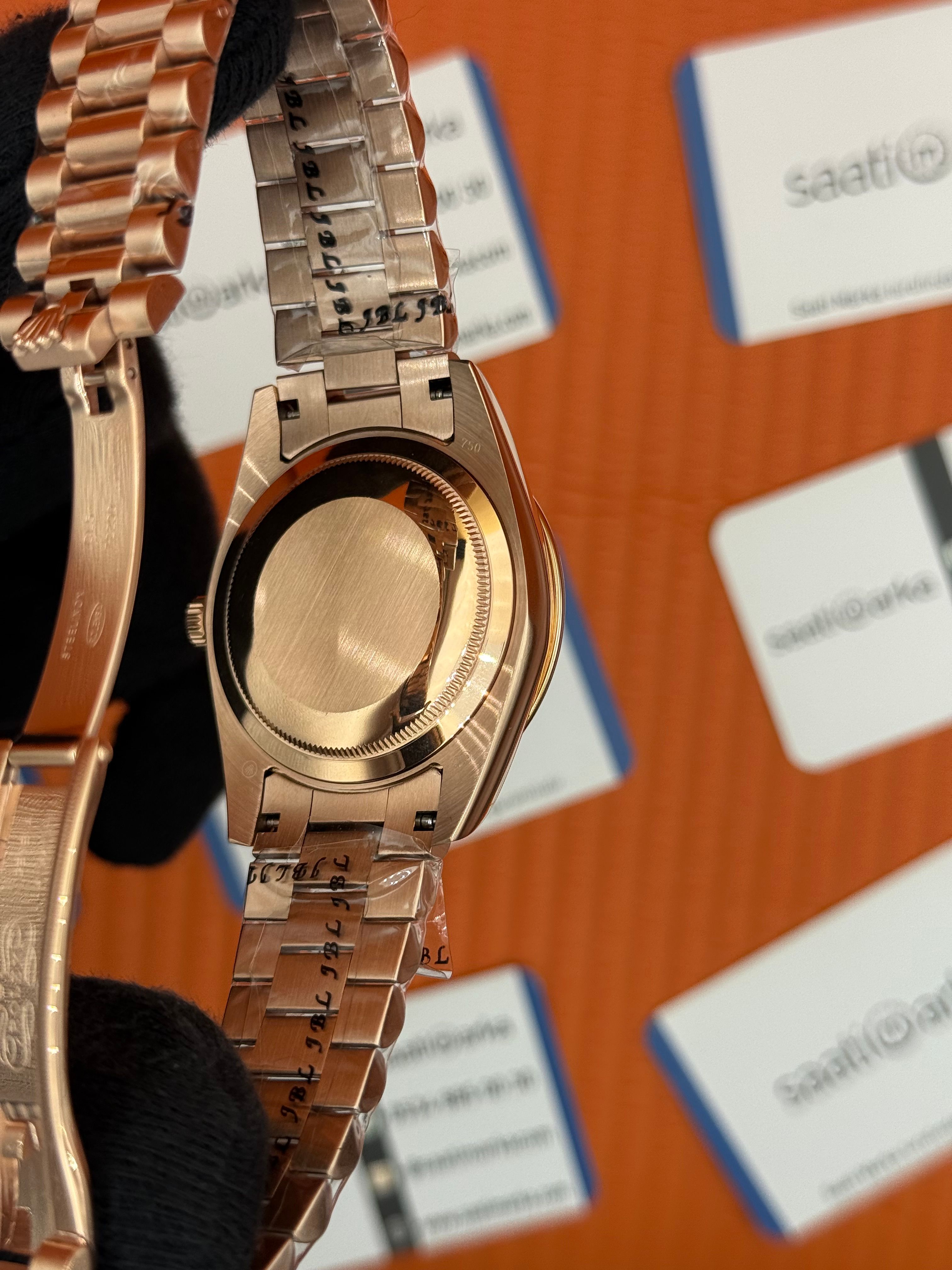ROLEX Day Date baget taşlı beyaz kadran rose kasa-kordon oyster