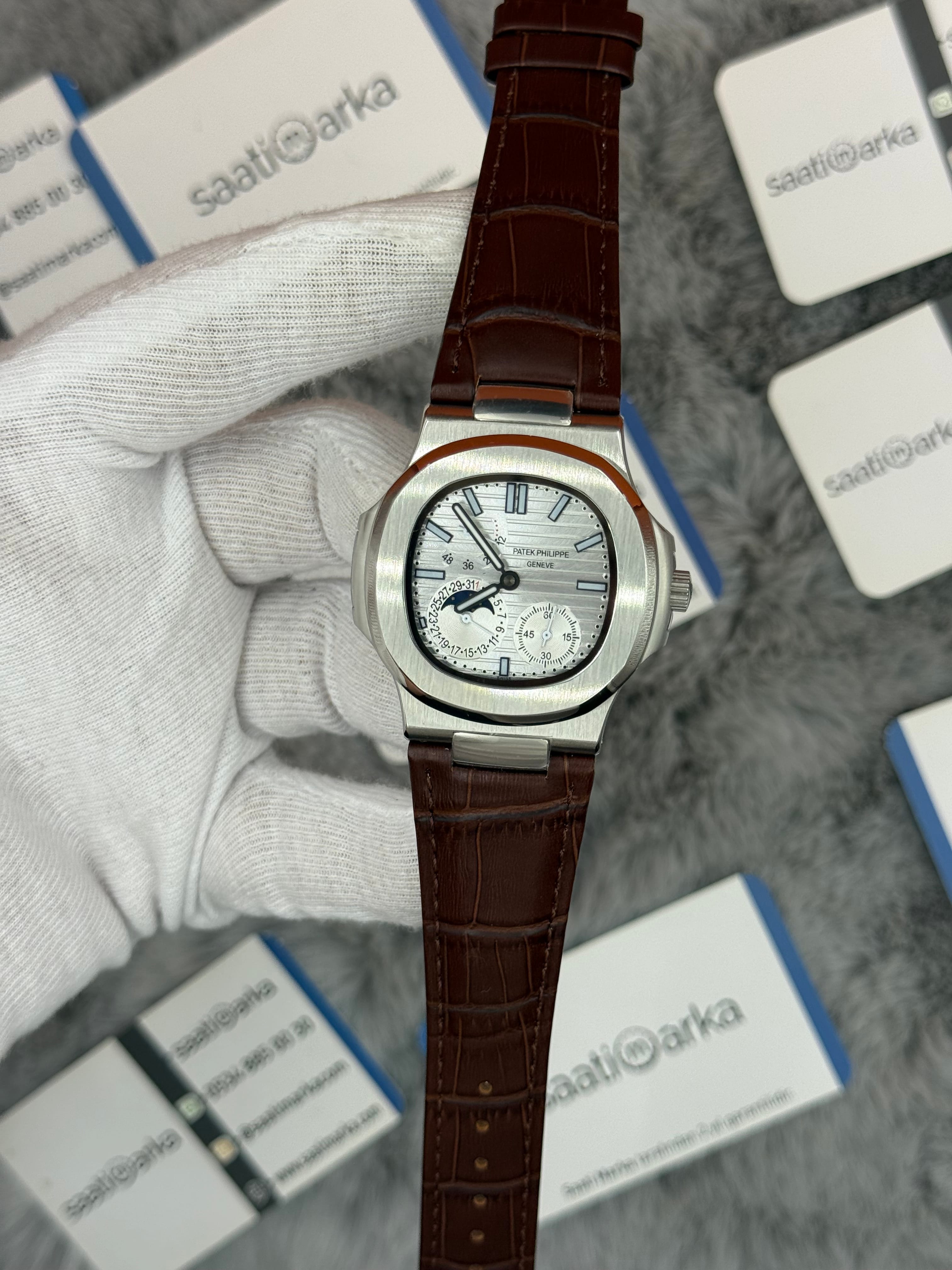 PATEK PHİLİPPE nautiilus moontphase 5712 beyaz kadran kahverengi deri kordon silver kasa 40mm erkek kol saati