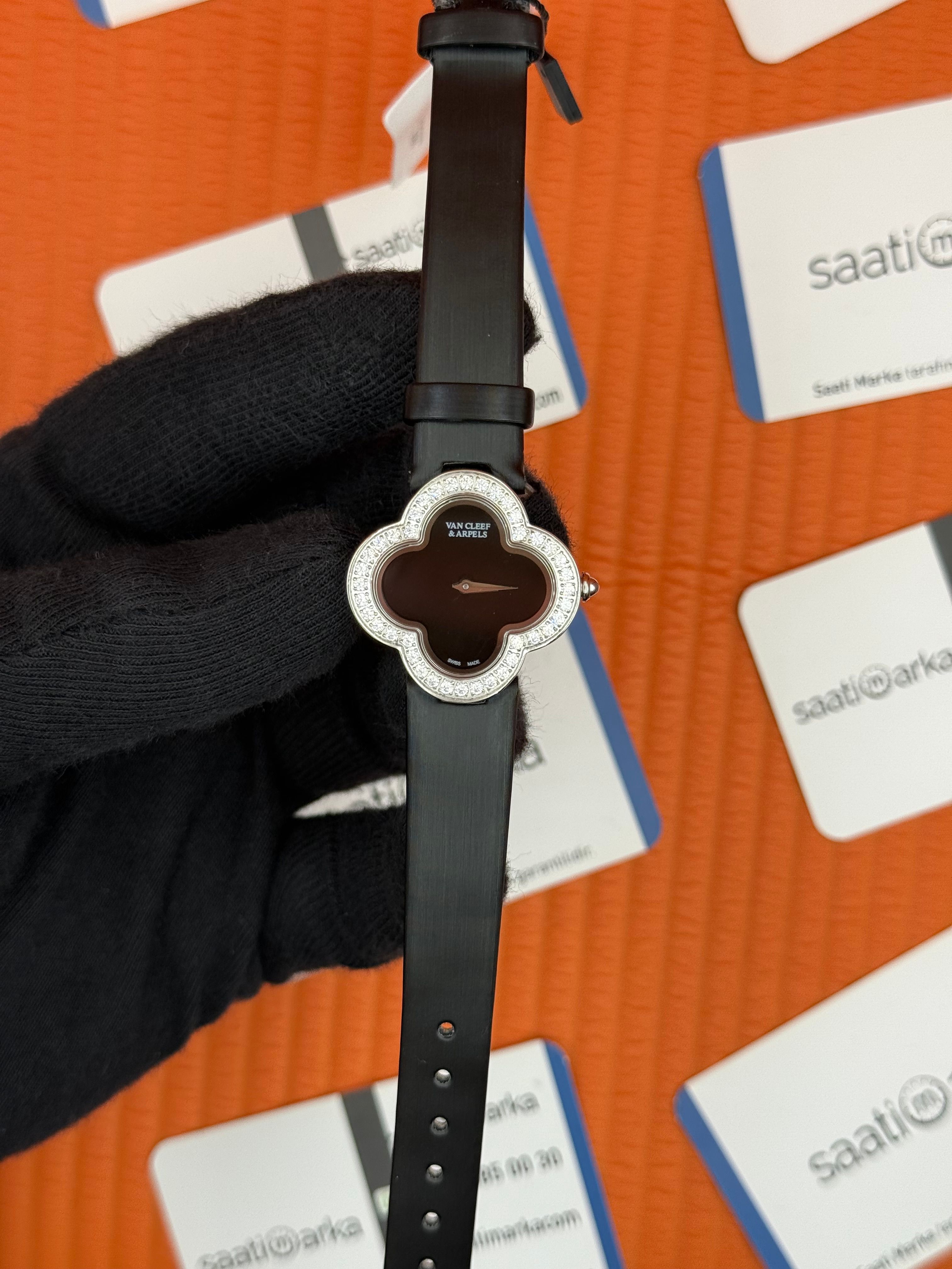 VAN CLEEF siyah kadran taşlı bezel deri kordon kadın kol saati 