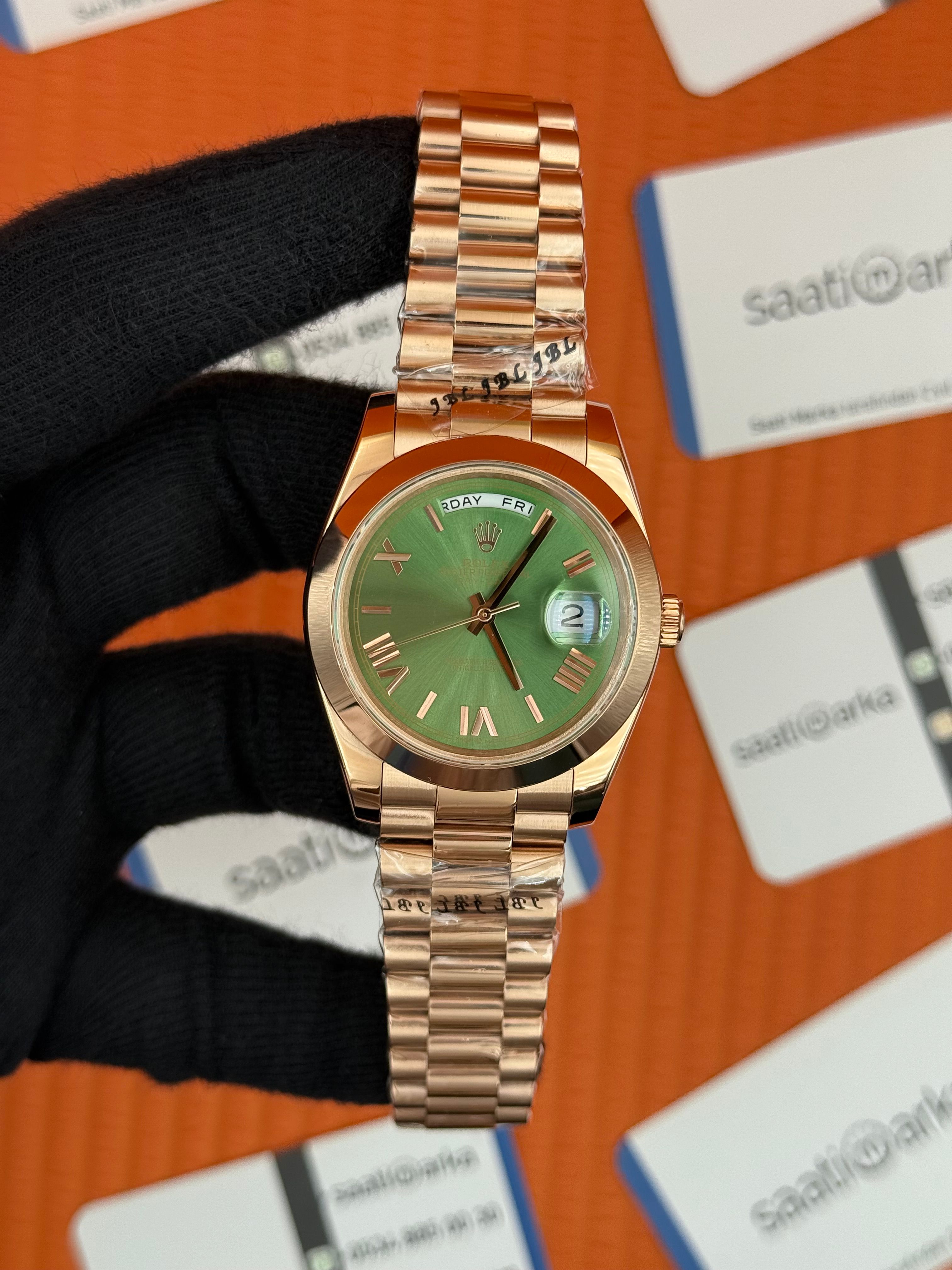 ROLEX Day Date roma rakamlı yeşil kadran rose kasa-kordon oyster