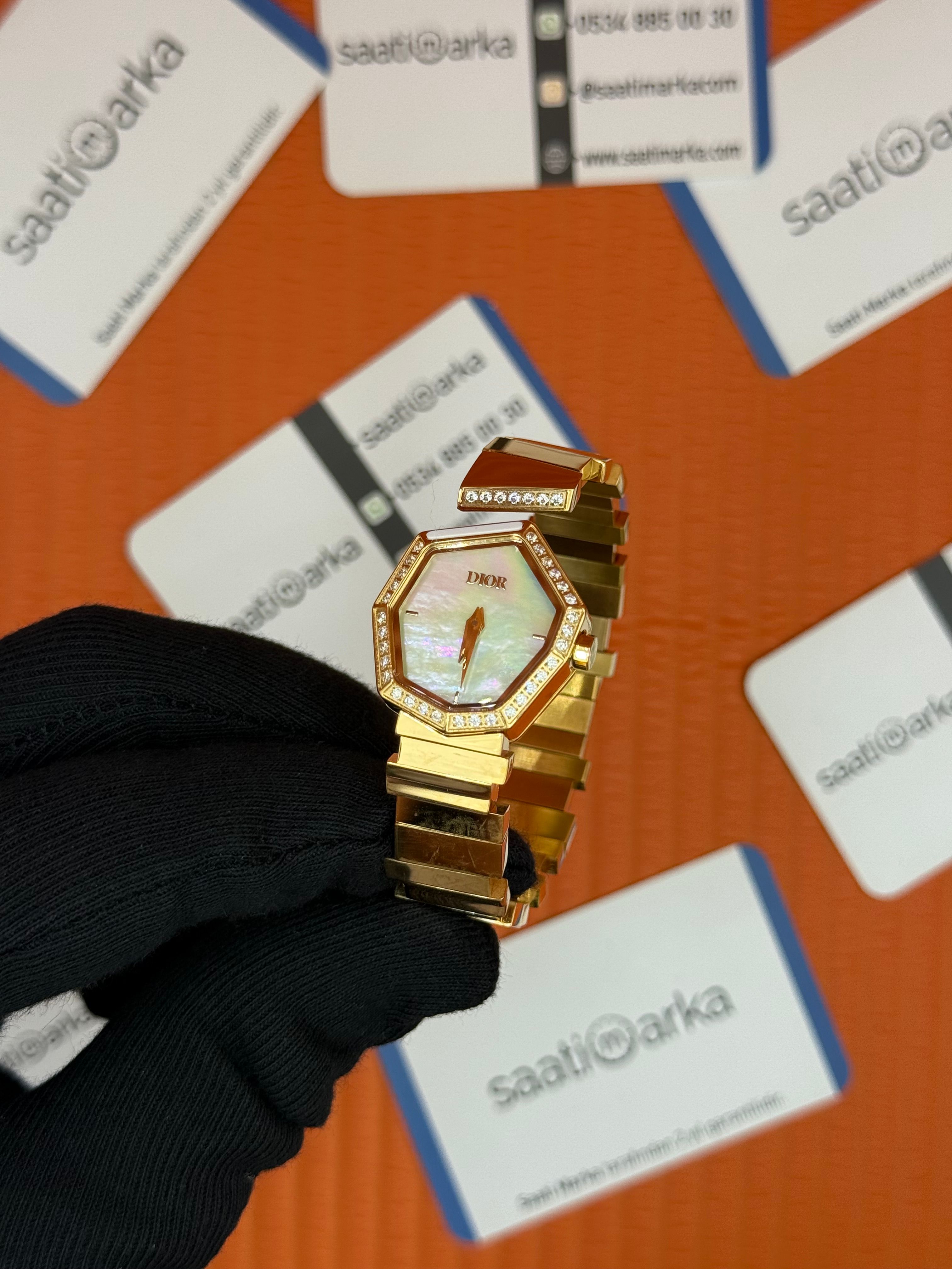 DİOR sedefli kadran taşlı bezel gold kasa kordon kadın kol saati