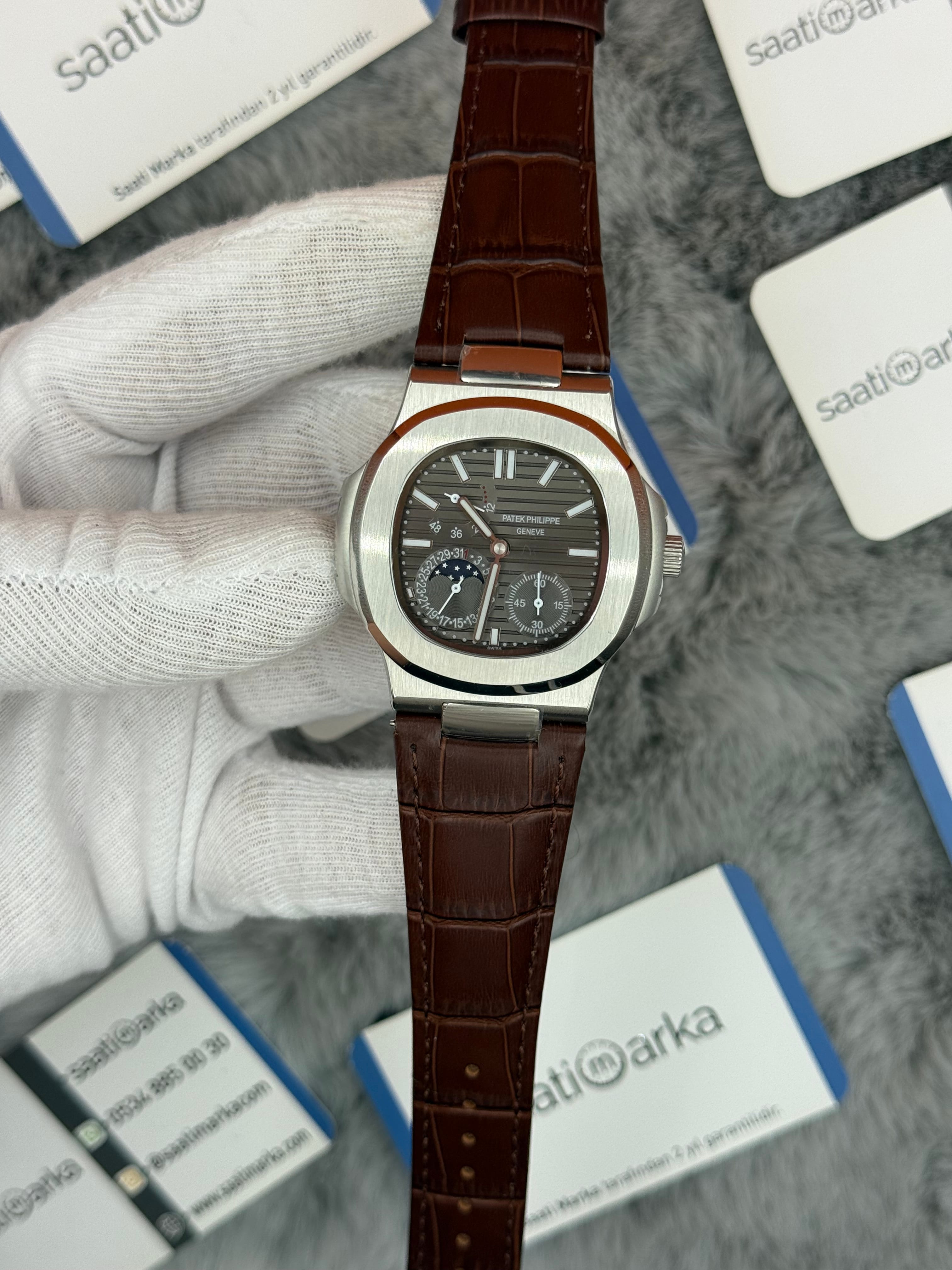 PATEK PHİLİPPE nautilus moontphase 5712 gri kadran kahverengi deri kordon silver kasa 40mm erkek kol saati