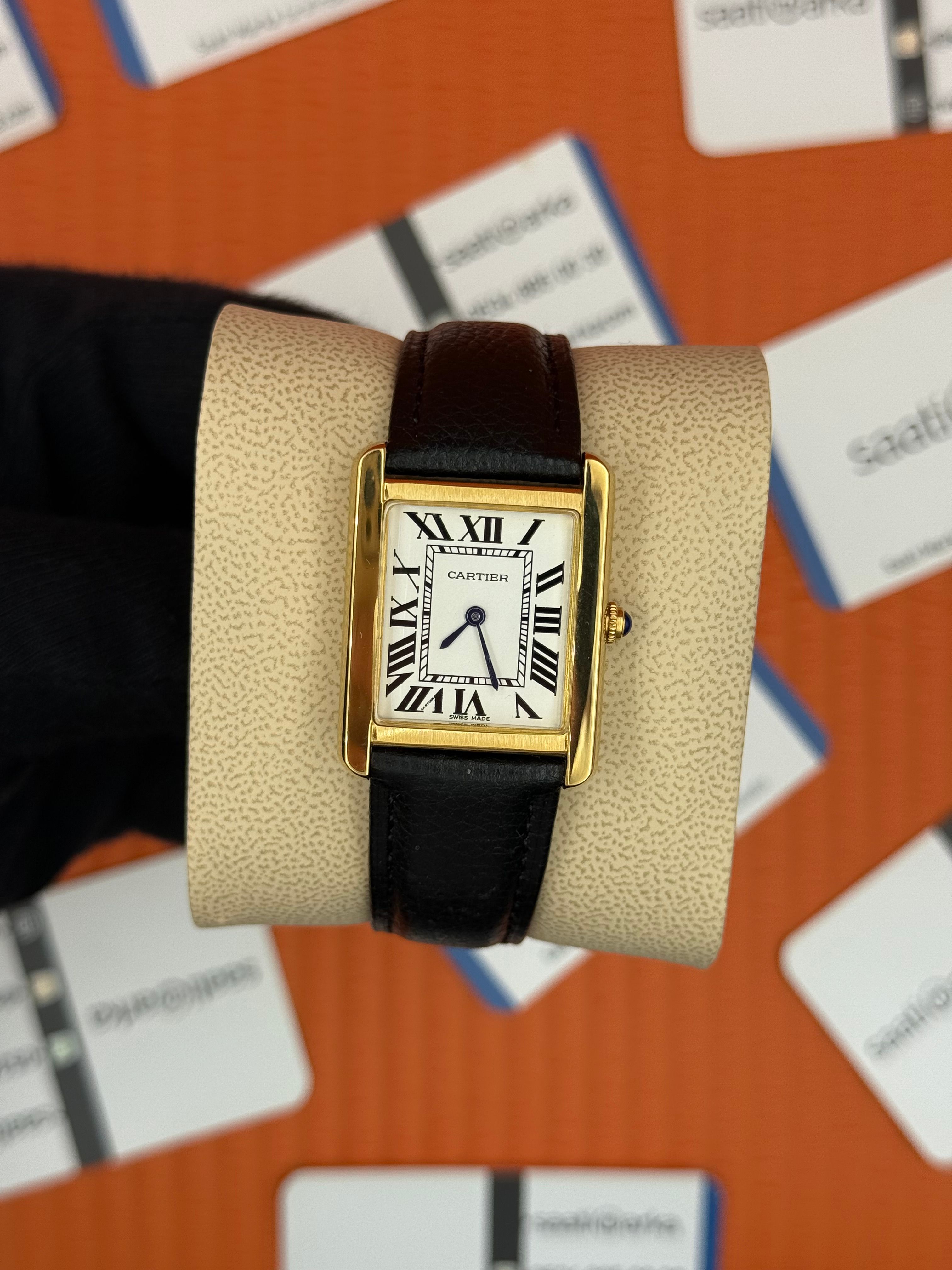 CARTIER Tank 29mm kadın kol saati gold kasa siyah deri kordon