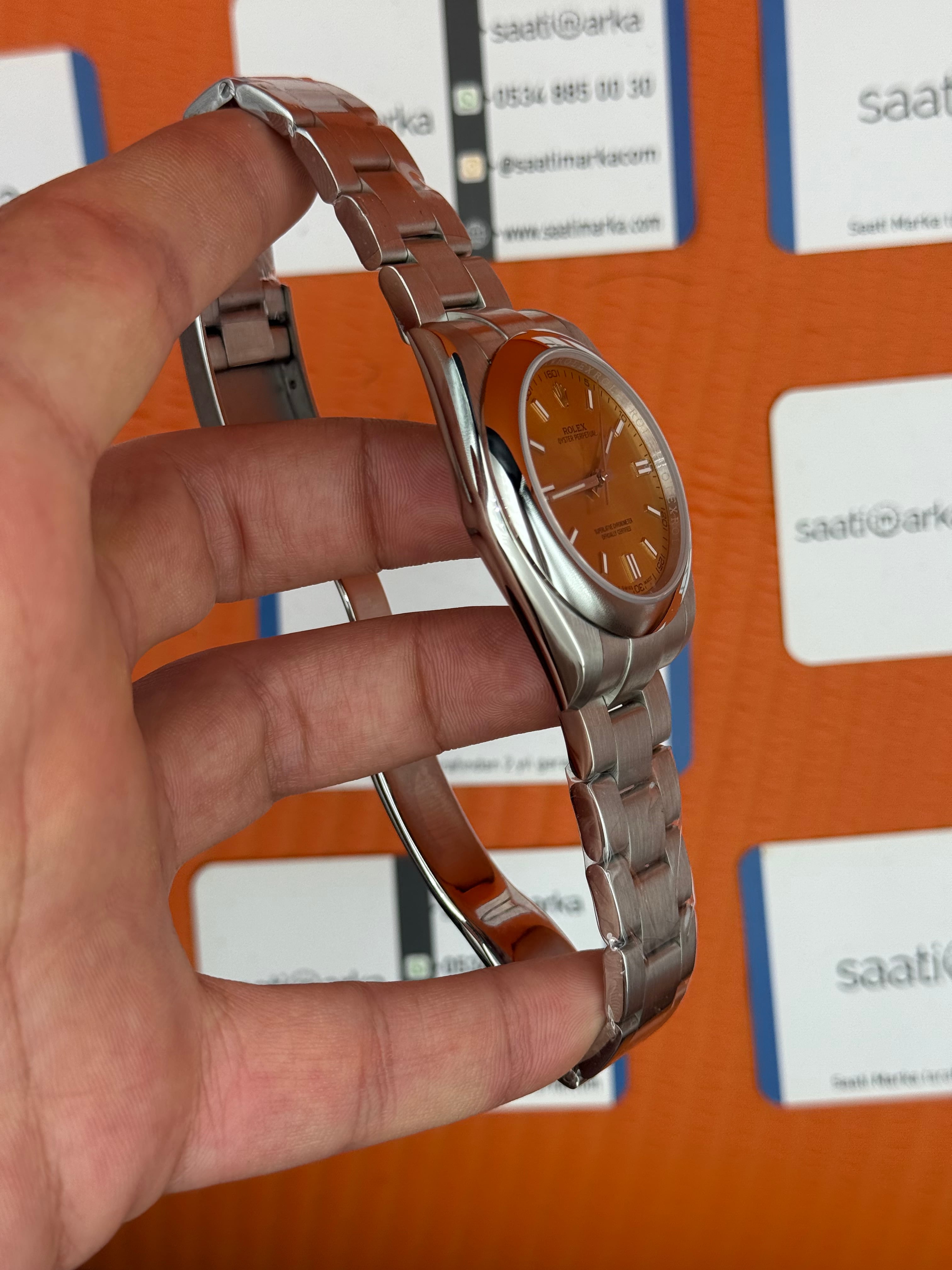 ROLEX oyster perpetual şampanya kadran silver kasa kordon erkek kol saati