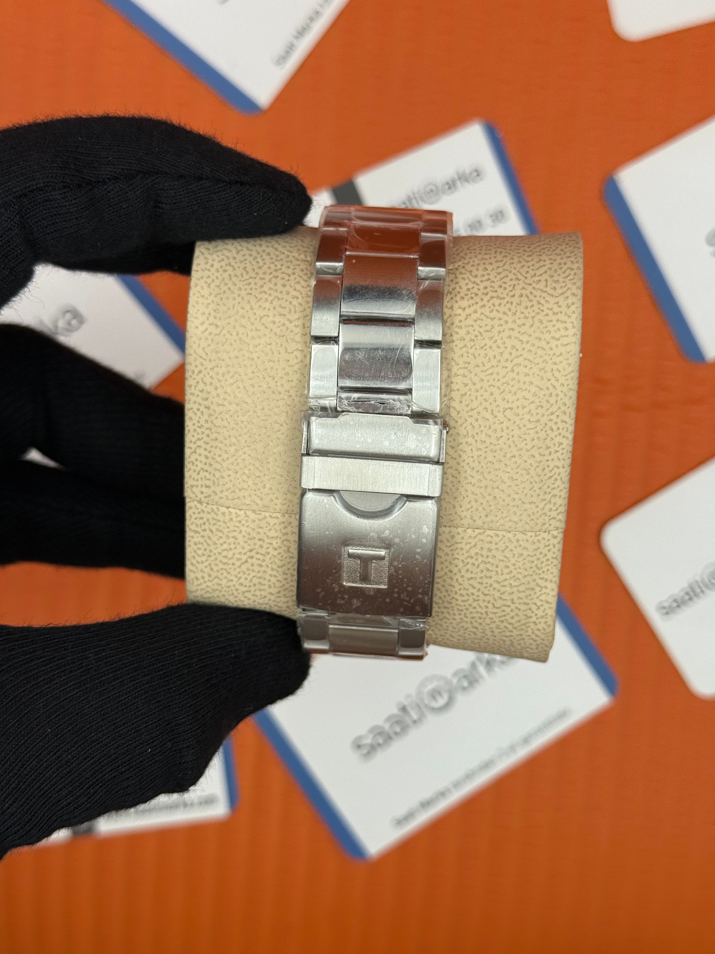 TISSOT siyah kadran silver kasa kordon erkek kol saati