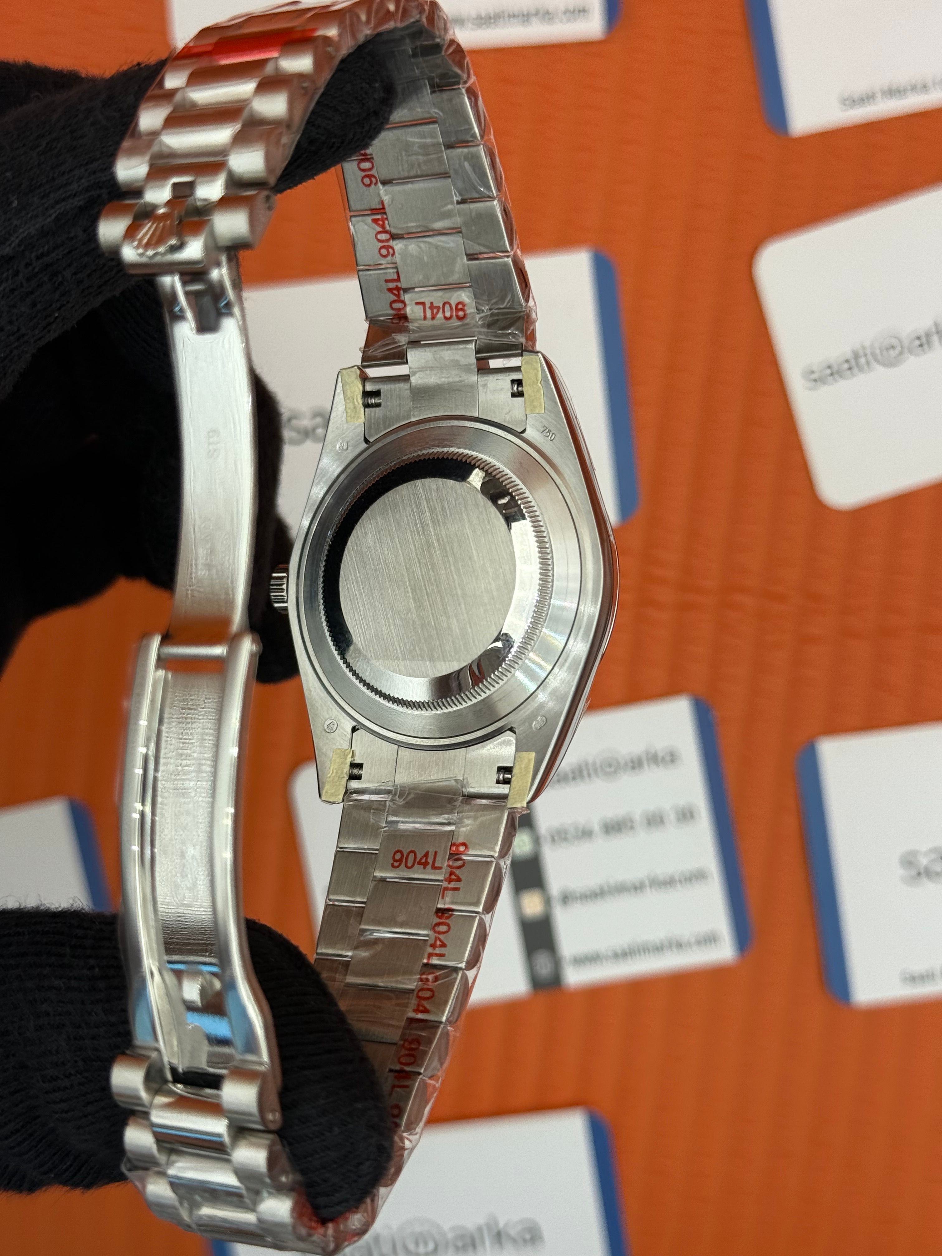 ROLEX Day Date cherry dial silver president kordon