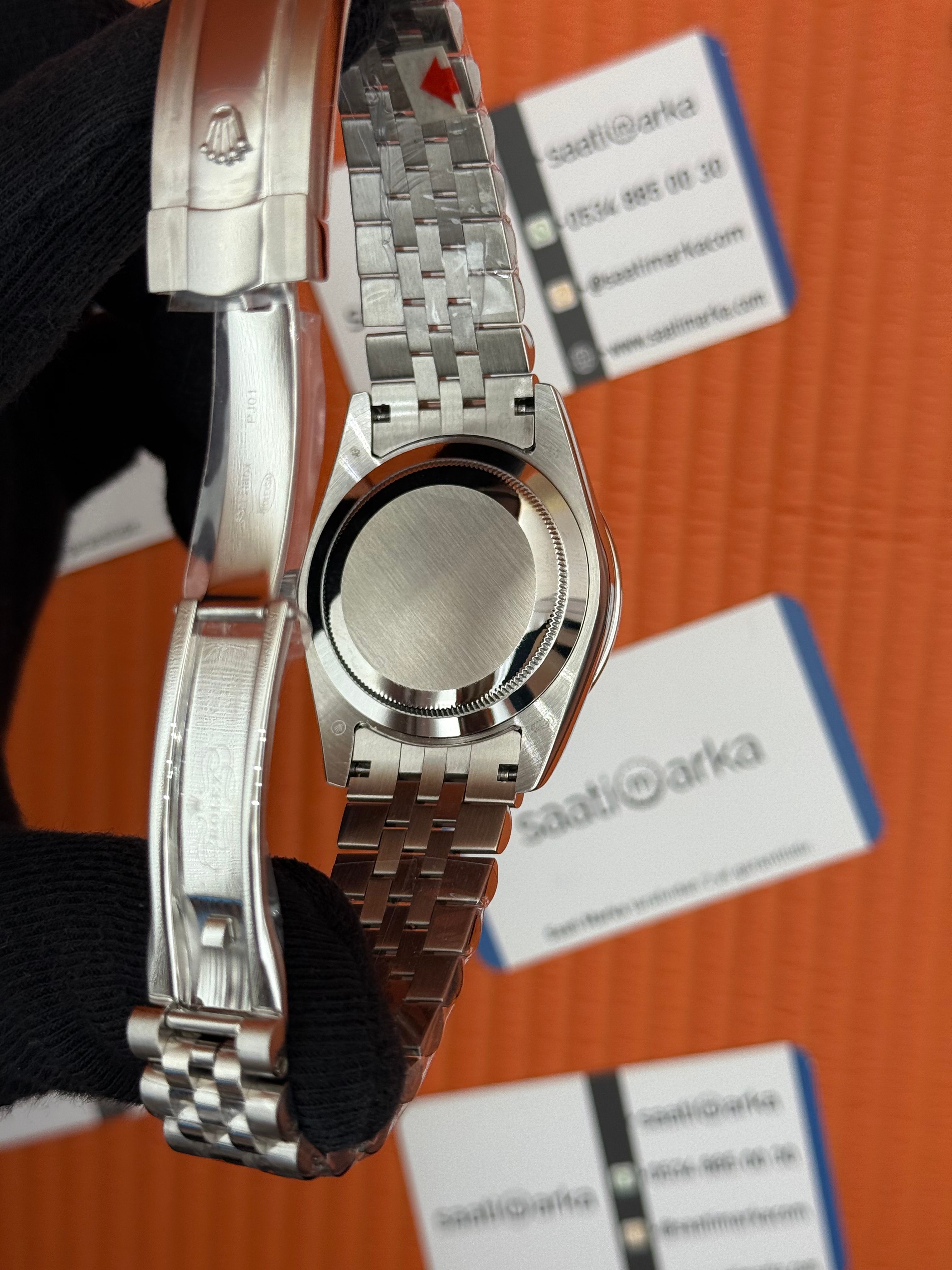 ROLEX  Datejust taşlı bezel baget taşlı blue dial silver jublee kordon