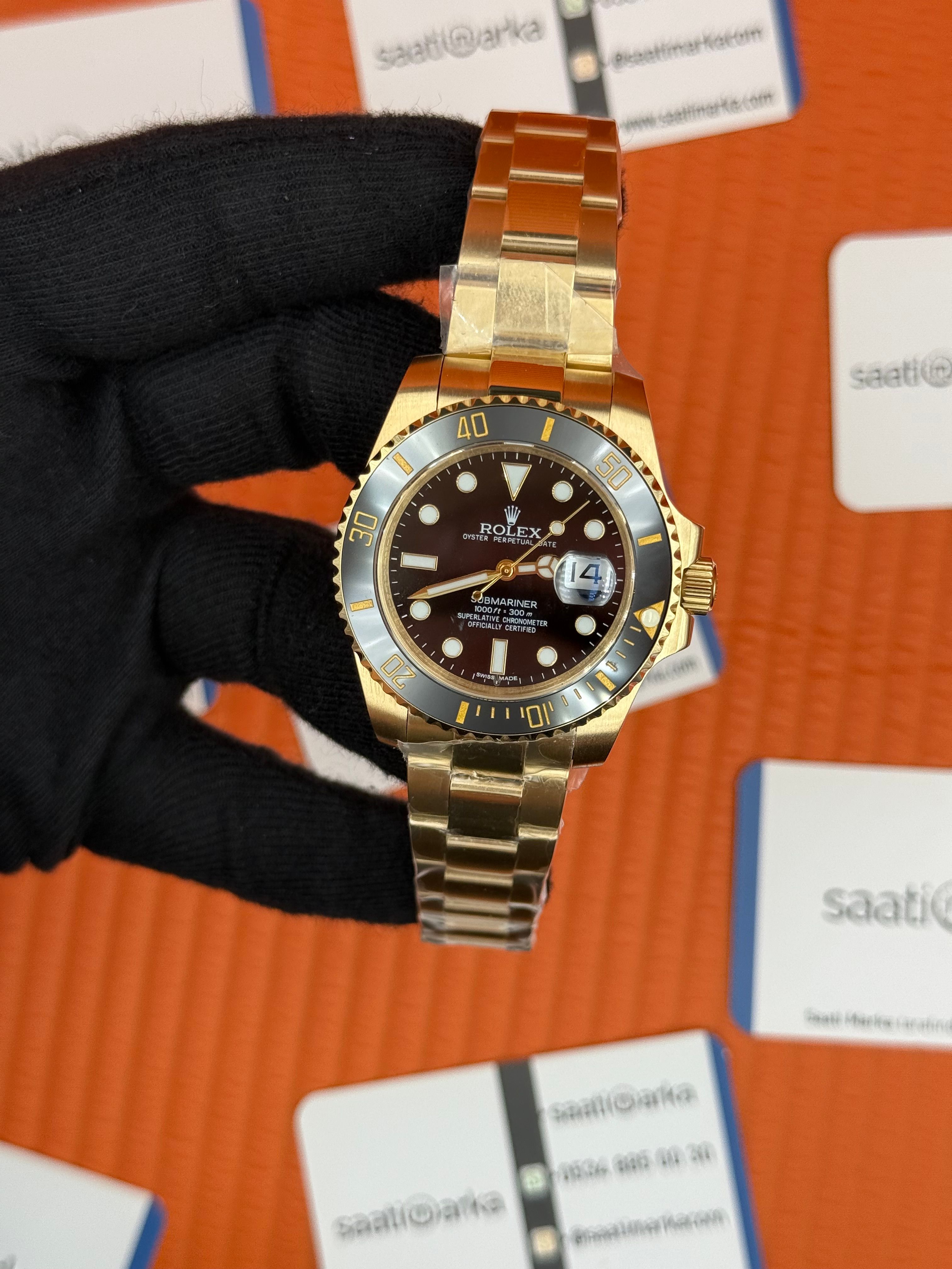 ROLEX Submariner oyster blacil dial gold kasa-kordon