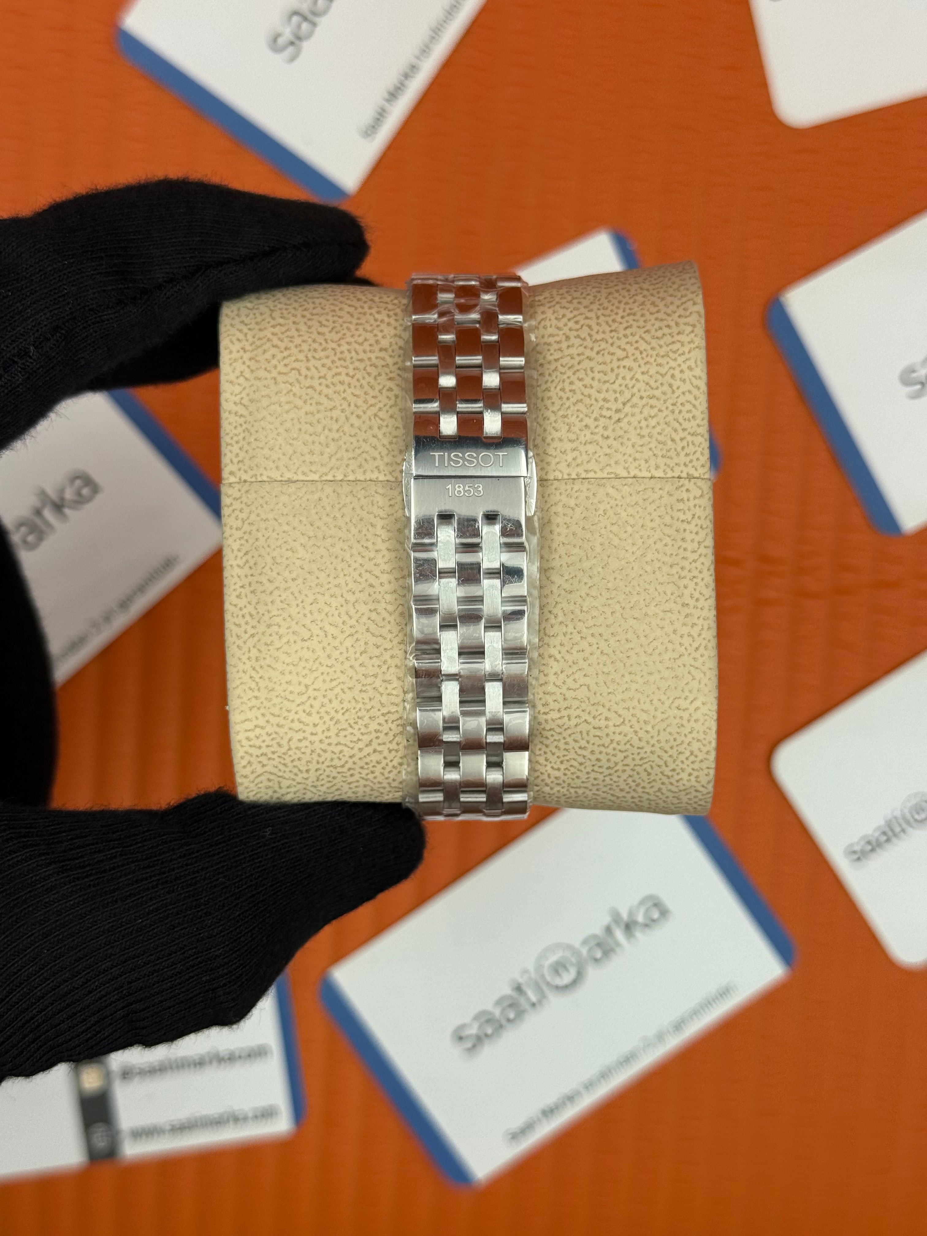TISSOT siyah baget taşlı kadran silver kasa kordon kadın kol saati