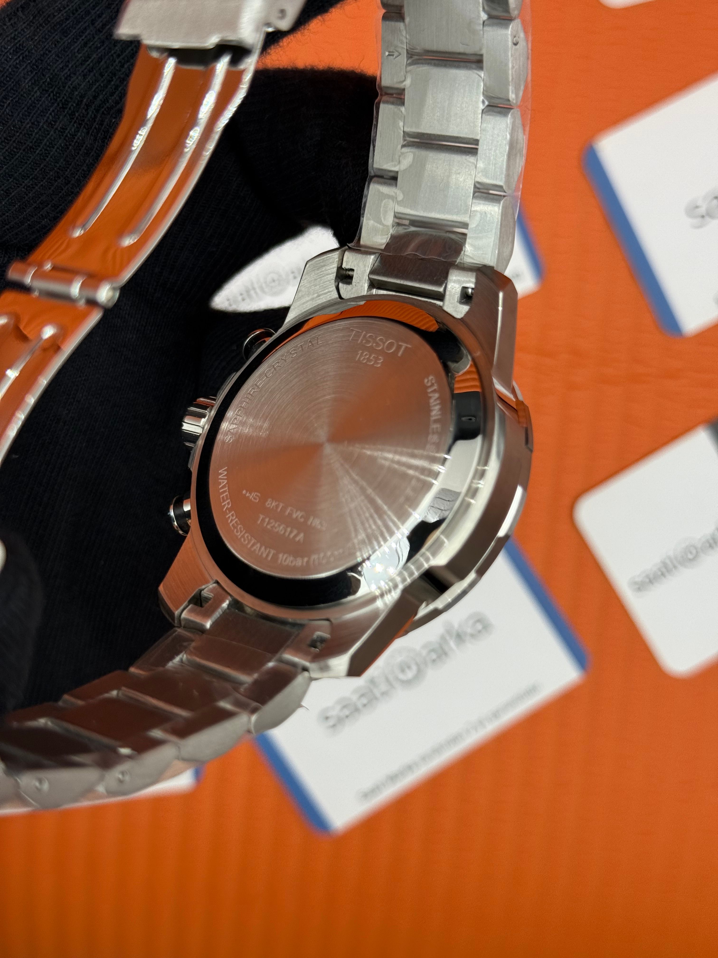 TISSOT siyah kadran silver kasa kordon erkek kol saati