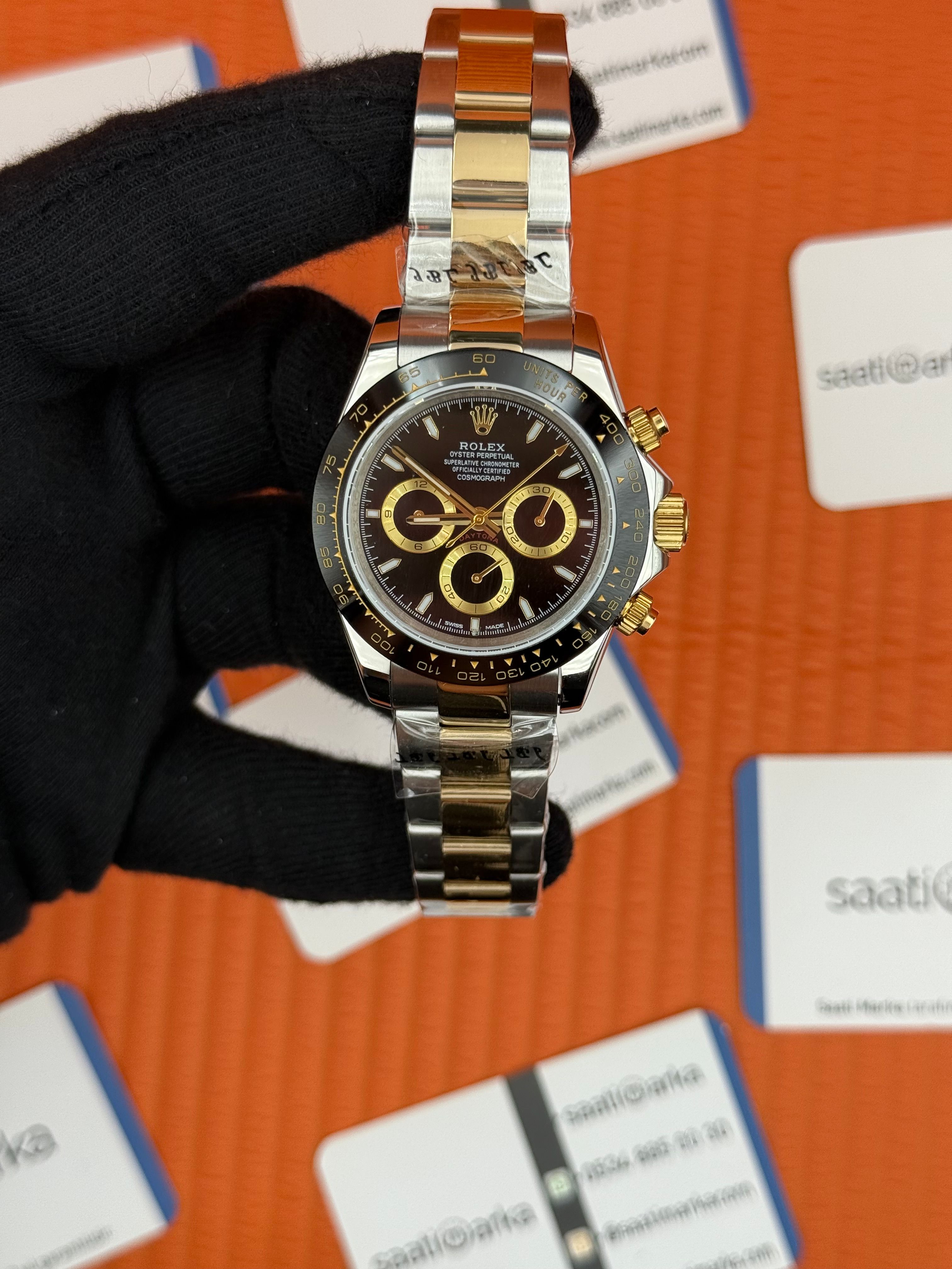 ROLEX Daytona black dial gold silver kasa-kordon
