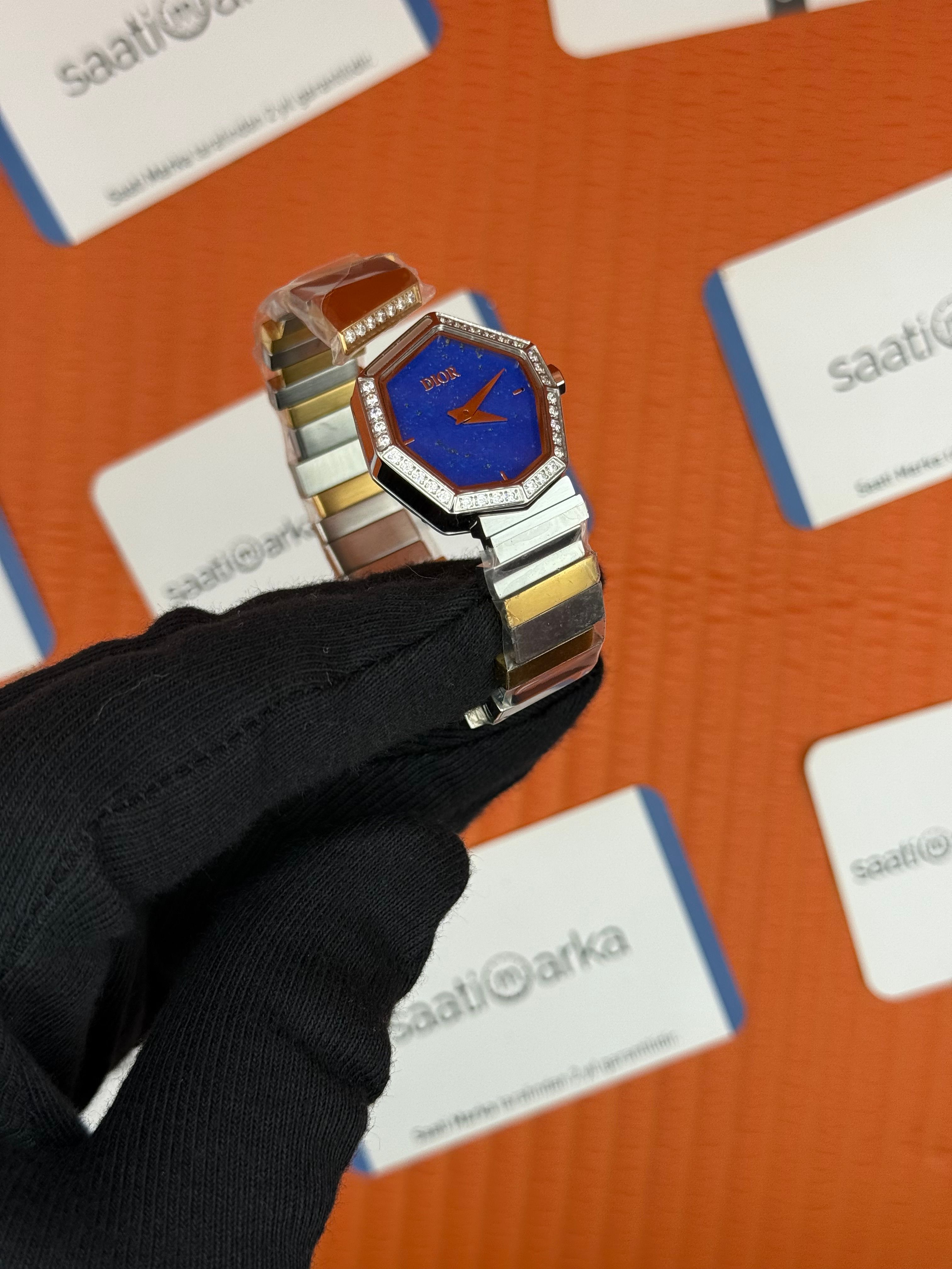 DİOR taşlı bezel mavi kadran gold silver kordon kadın kol saati