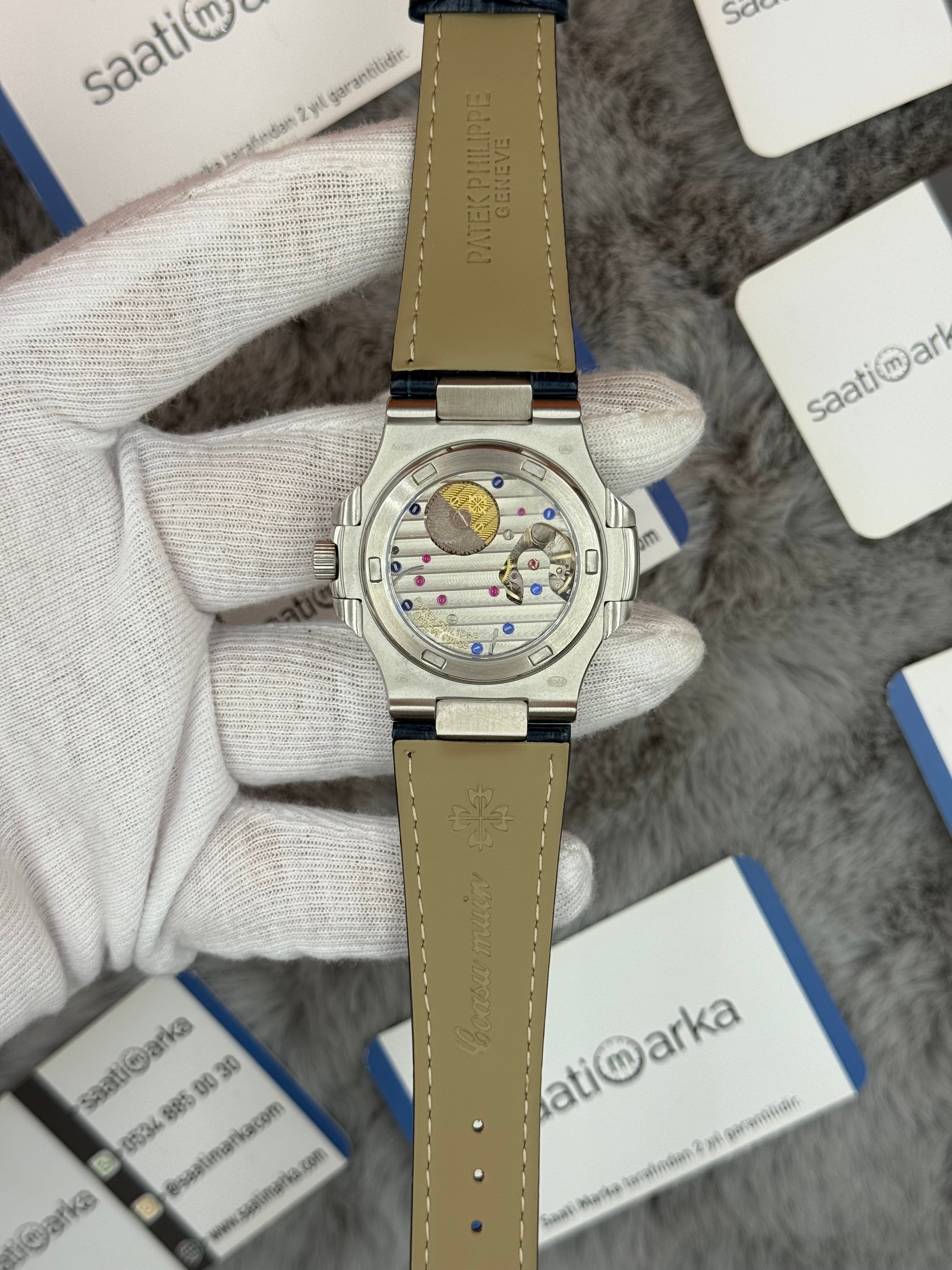 PATEK PHİLİPPE nautilus moontphase 5712 taşlı bezel lacivert kadran lacivert deri kordon silver kasa 40mm erkek kol saati