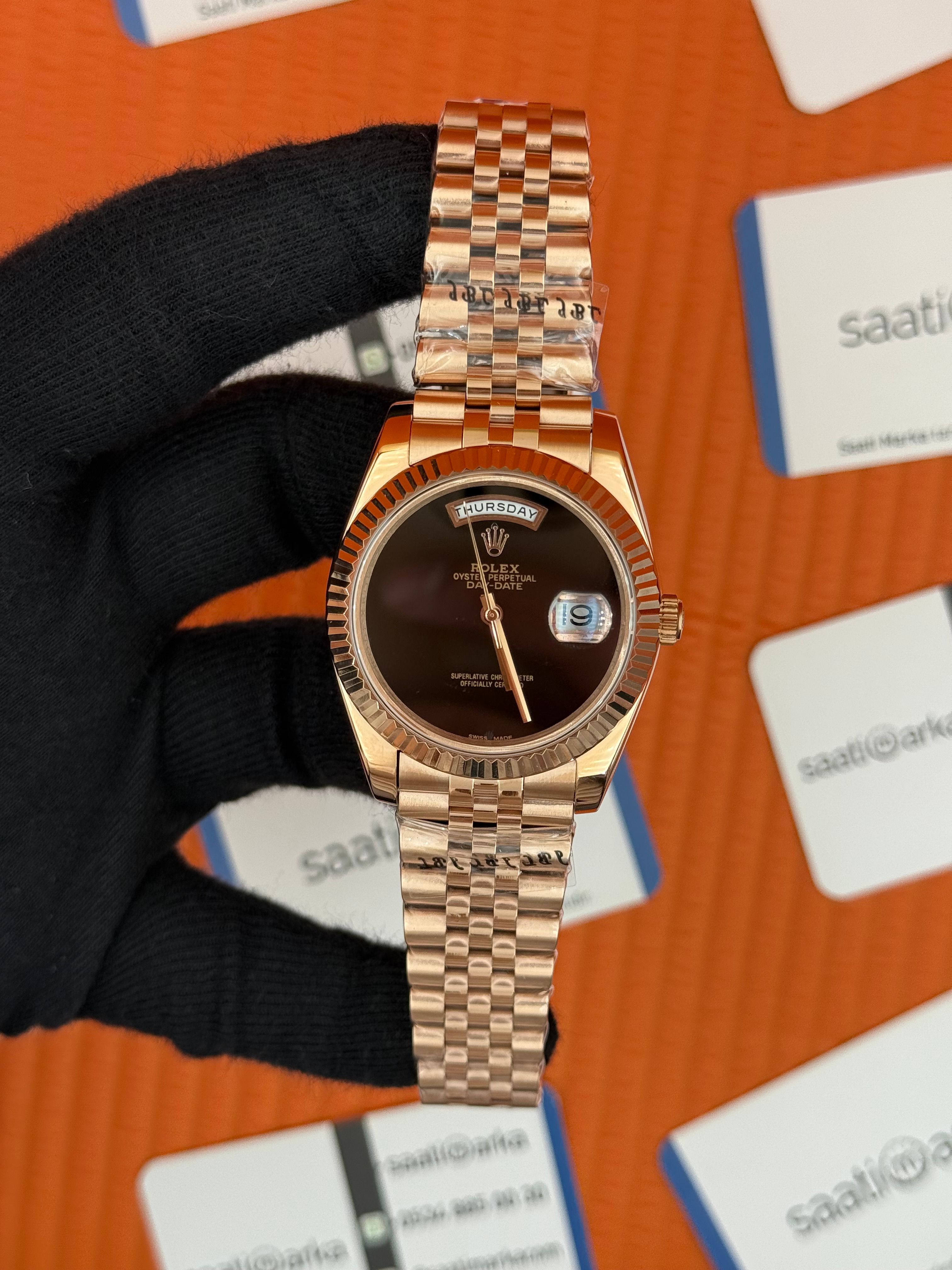 ROLEX Day Date siyah kadran rose kasa-kordon jubilee
