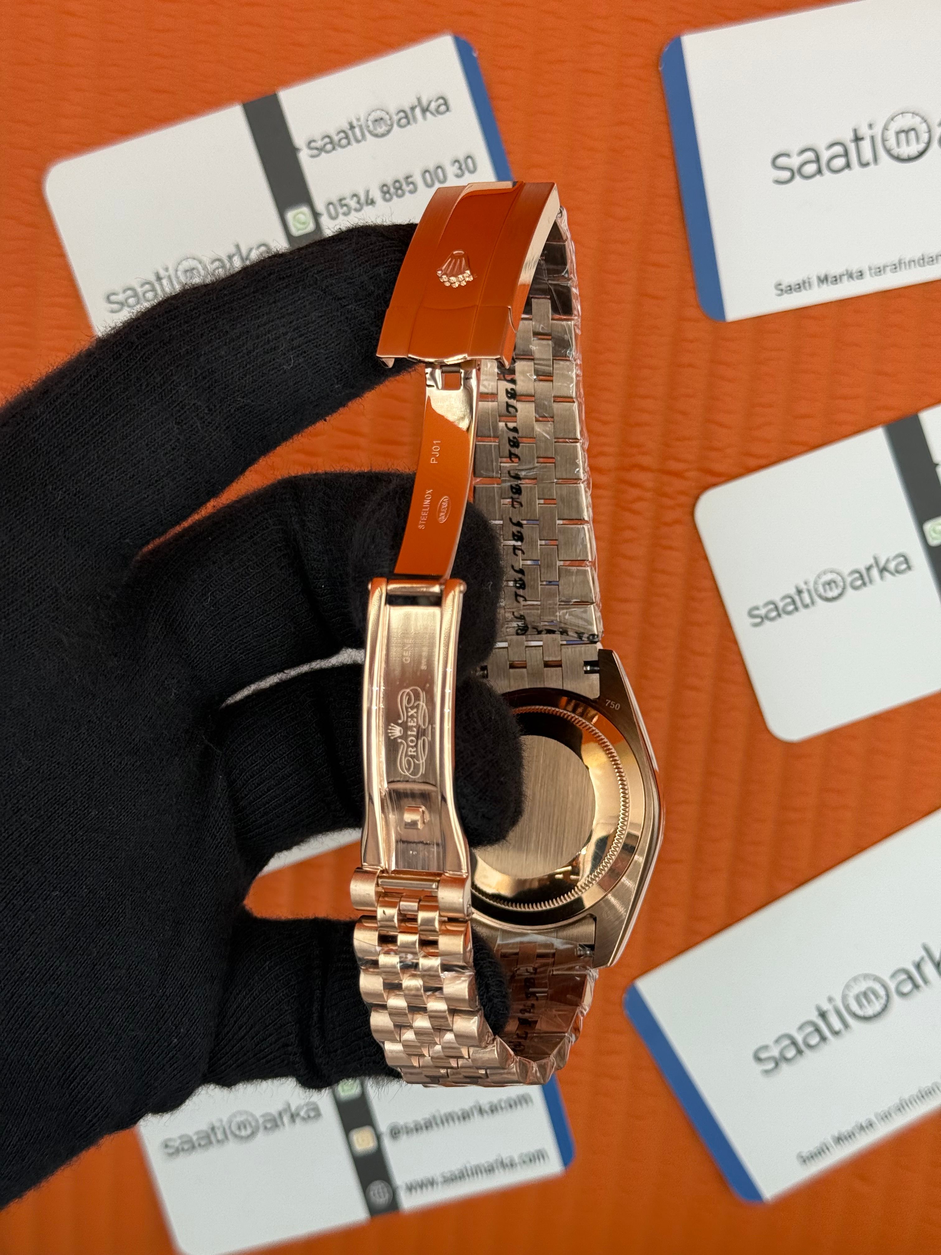 ROLEX Day Date siyah kadran rose kasa-kordon jubilee